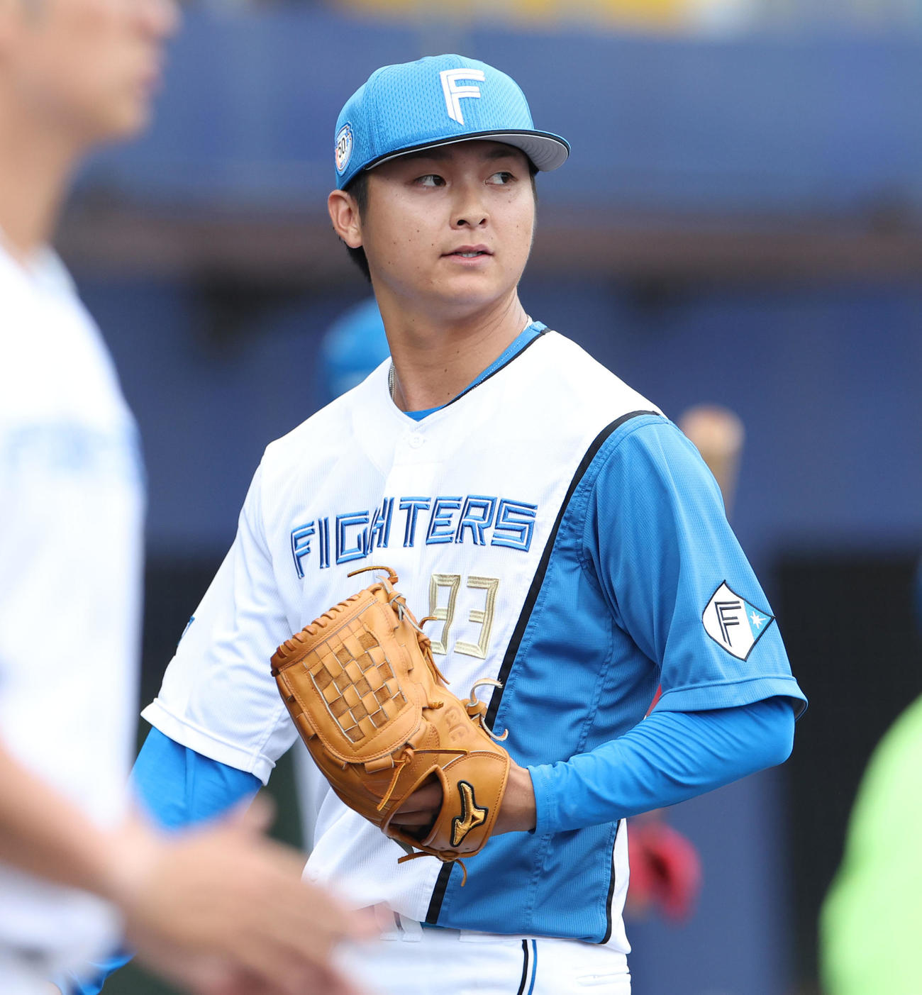日本ハム対サムスン　7回表を無失点に抑えベンチに戻る日本ハム田中瑛（撮影・佐藤翔太）