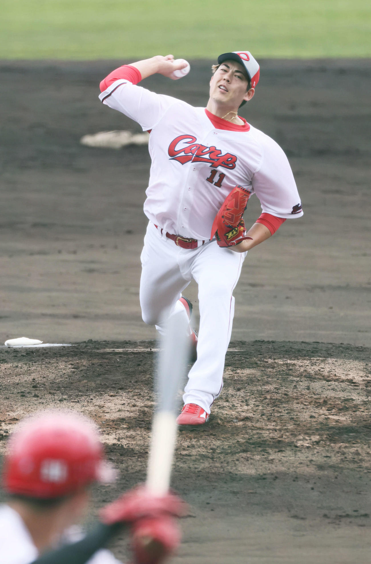 シート打撃に登板した広島九里（撮影・加藤孝規）