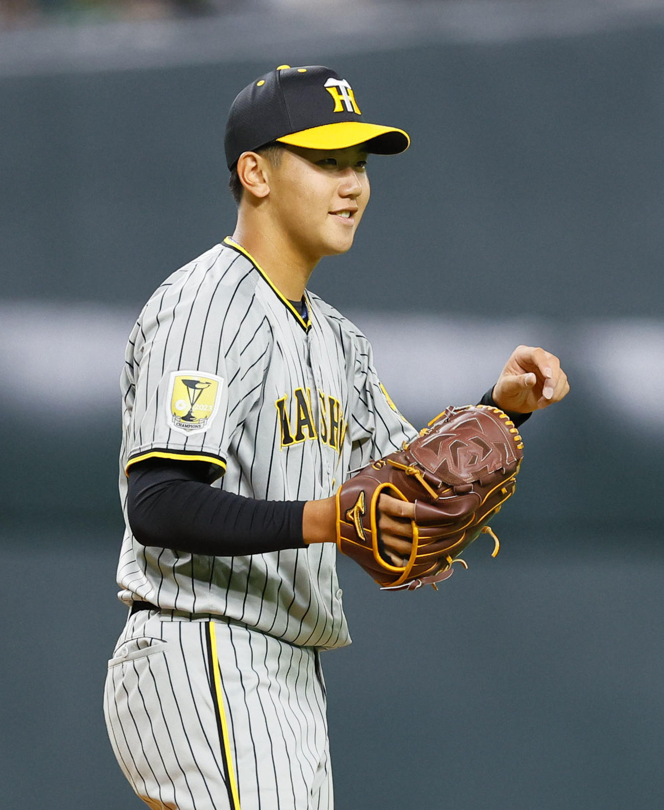 日本ハム対阪神　1回裏日本ハム無死、細川を三振に仕留め笑顔を見せる阪神門別（撮影・藤尾明華）