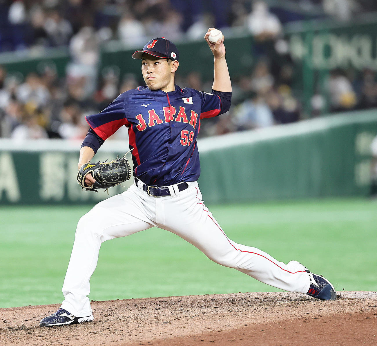 2023年11月、台湾戦で登板する根本悠楓