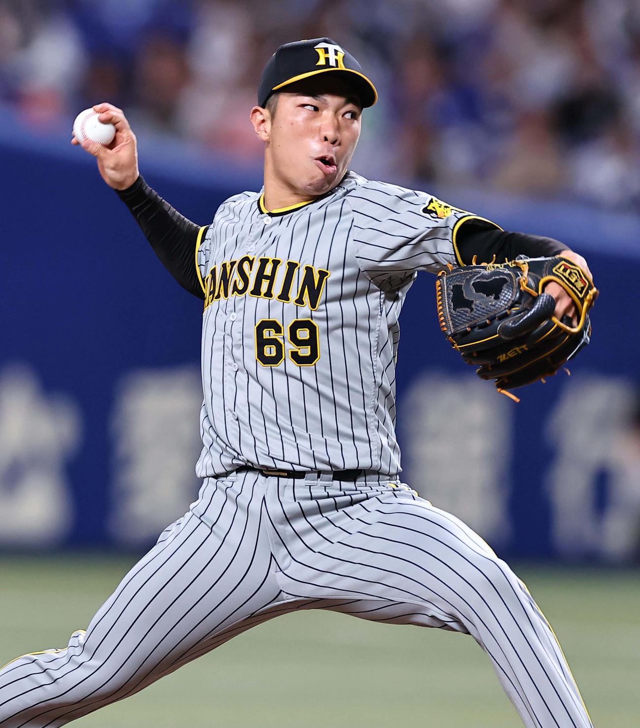 阪神対中日　阪神3番手の石井（撮影・上田博志）