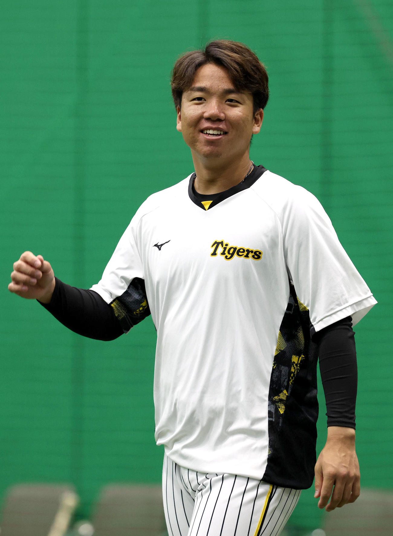 笑顔を見せる村上（撮影・白石智彦）