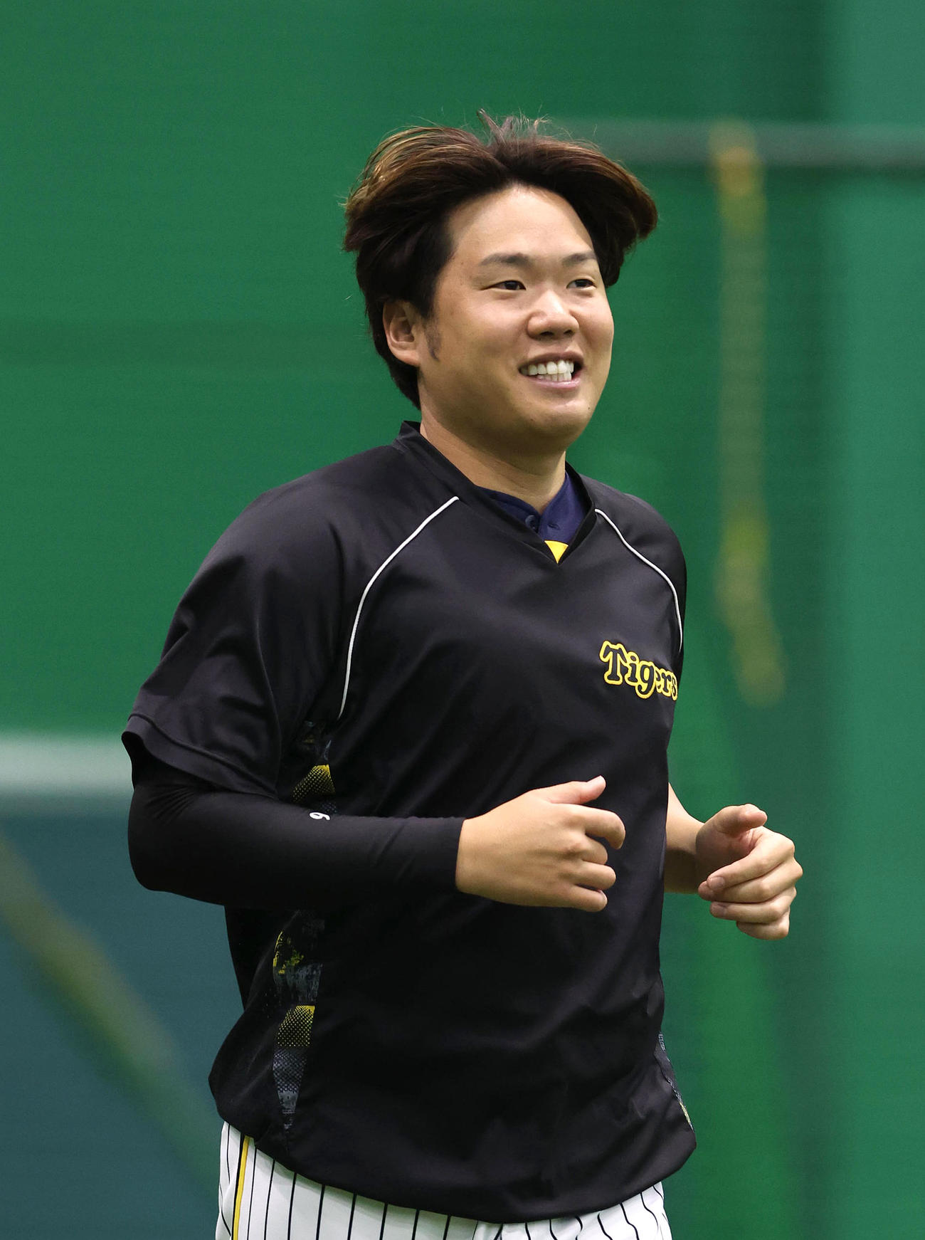 ランニングする西勇（撮影・白石智彦）