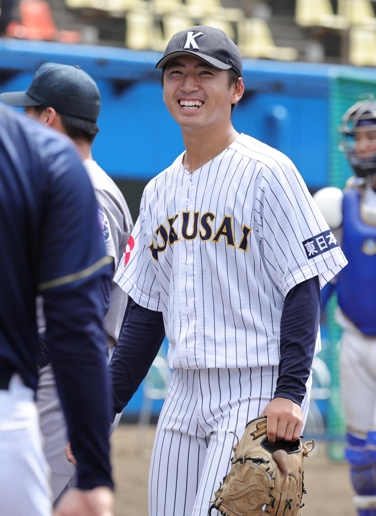笑顔を見せる東日本国際大・藤井（撮影・野上伸悟）