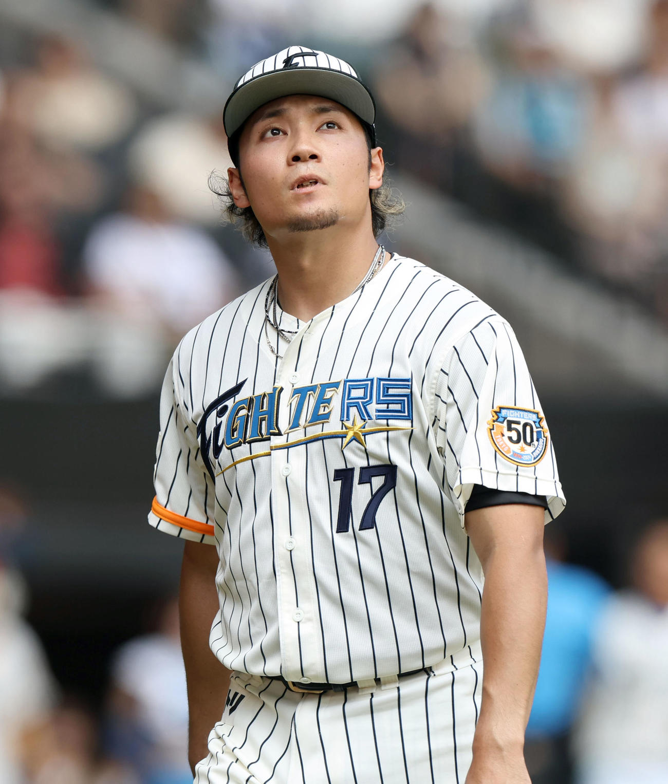 日本ハム対ソフトバンク　3回表、先制を許しベンチに戻る伊藤（撮影・佐藤翔太）
