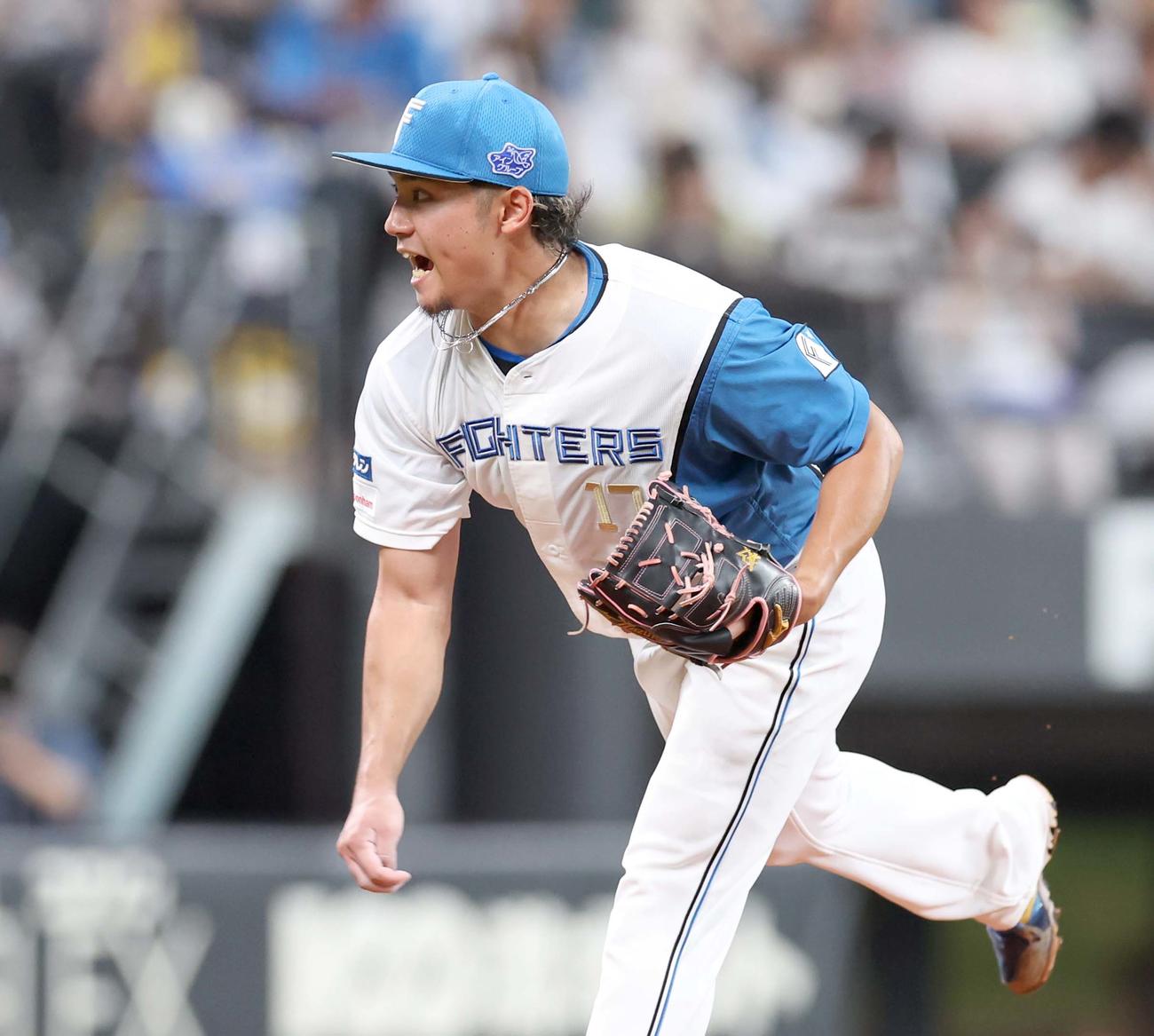 日本ハム対西武　9回表、叫びながら力投する伊藤（撮影・黒川智章）