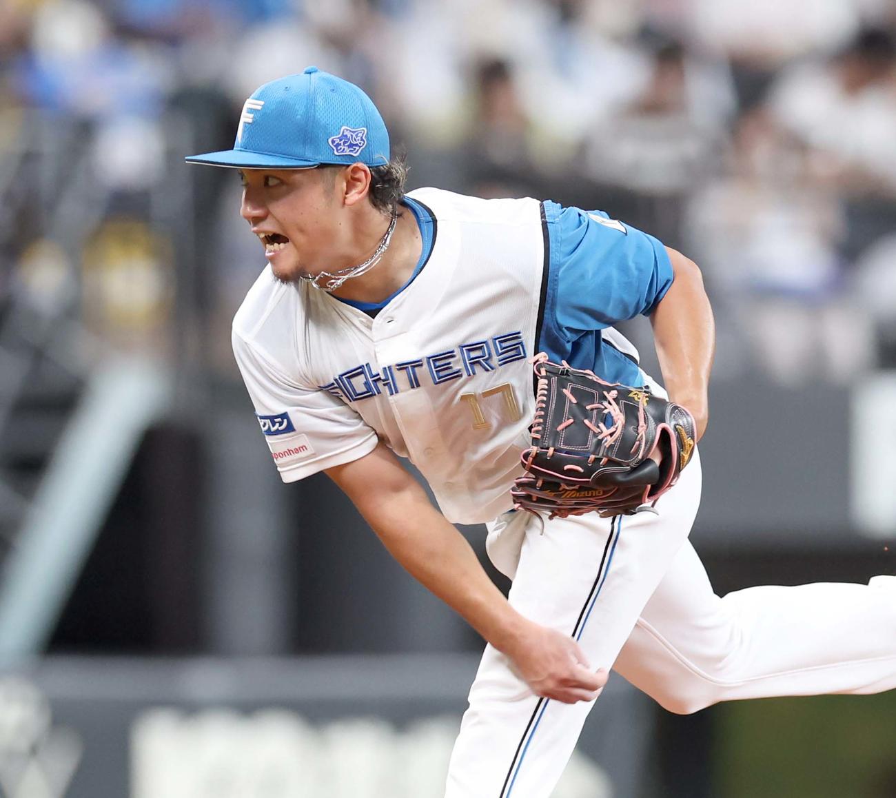 日本ハム対西武　9回表、叫びながら力投する伊藤（撮影・黒川智章）