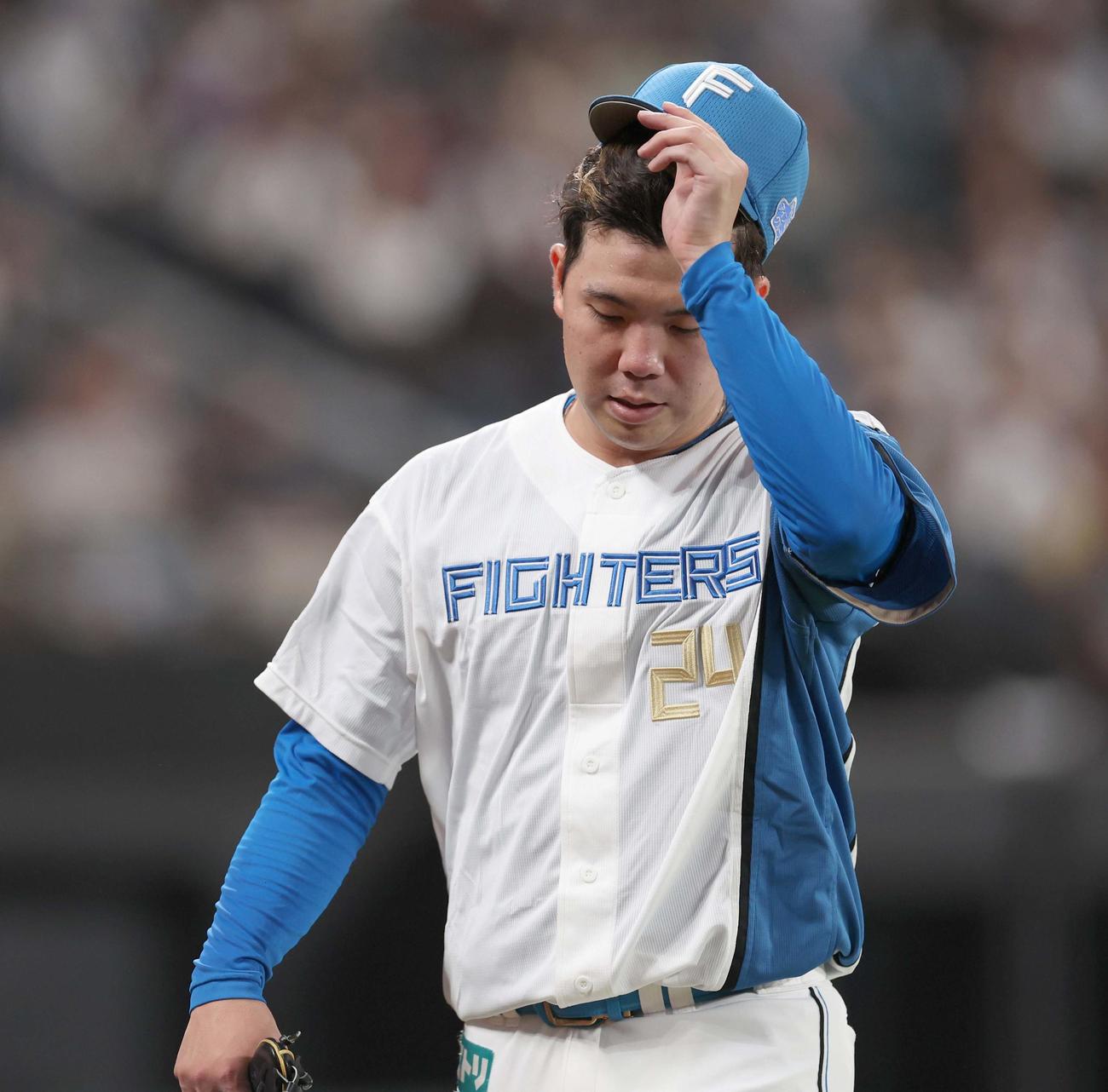日本ハム対オリックス　6回表、失点し渋い表情の金村（撮影・黒川智章）