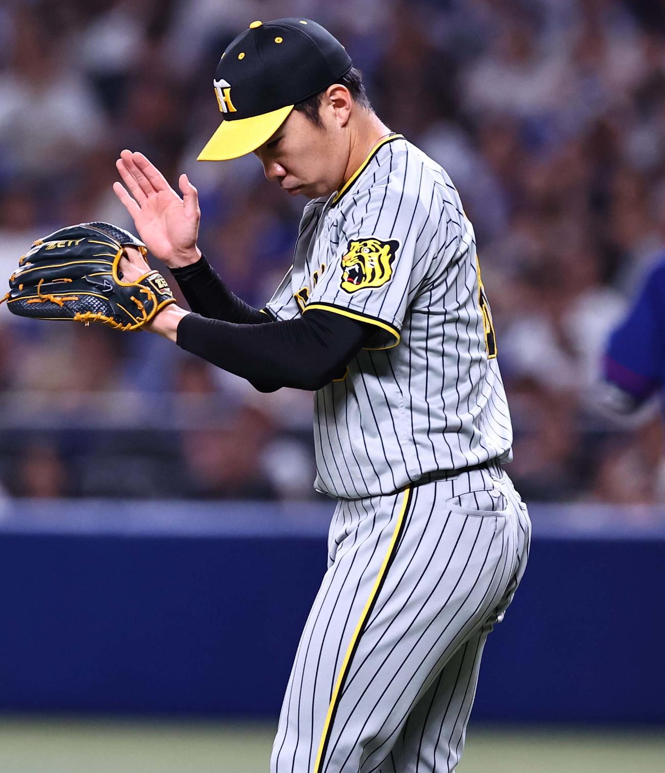 中日対阪神　阪神3番手の石井は6回を無失点に抑える（撮影・上田博志）