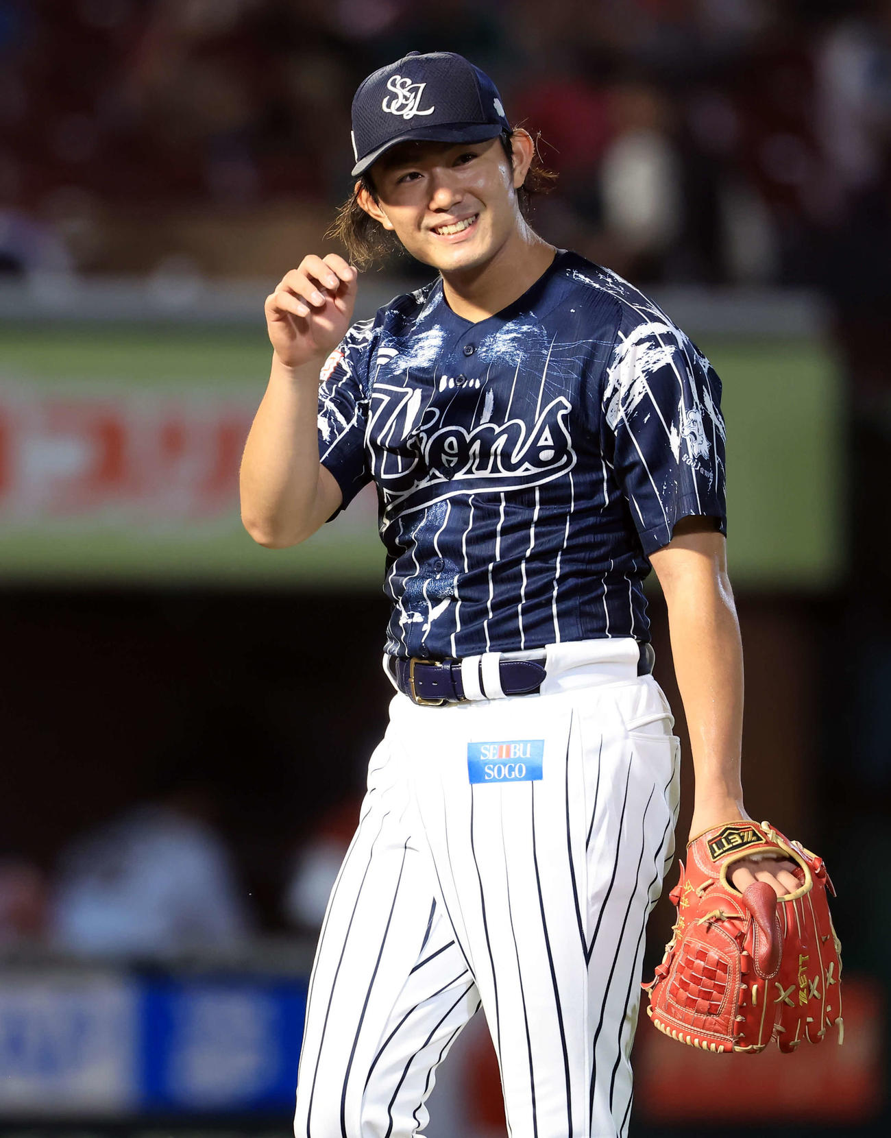楽天対西武　5回裏楽天の攻撃を無失点で抑えた今井は笑みを浮かべる（撮影・浅見桂子）