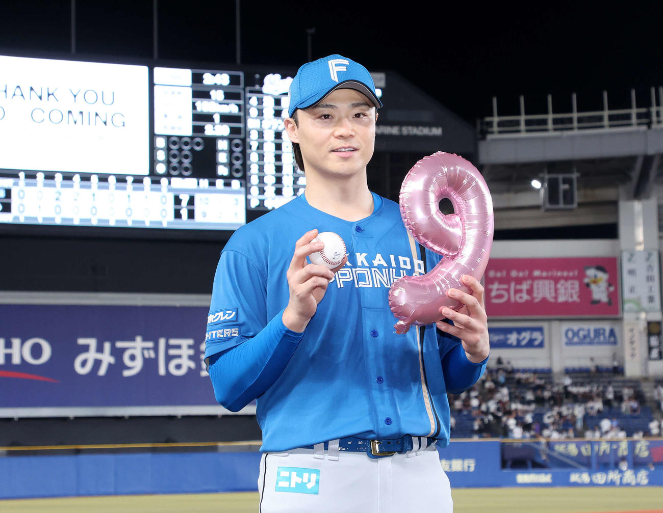 8月21日、9勝目を挙げた日本ハム山崎