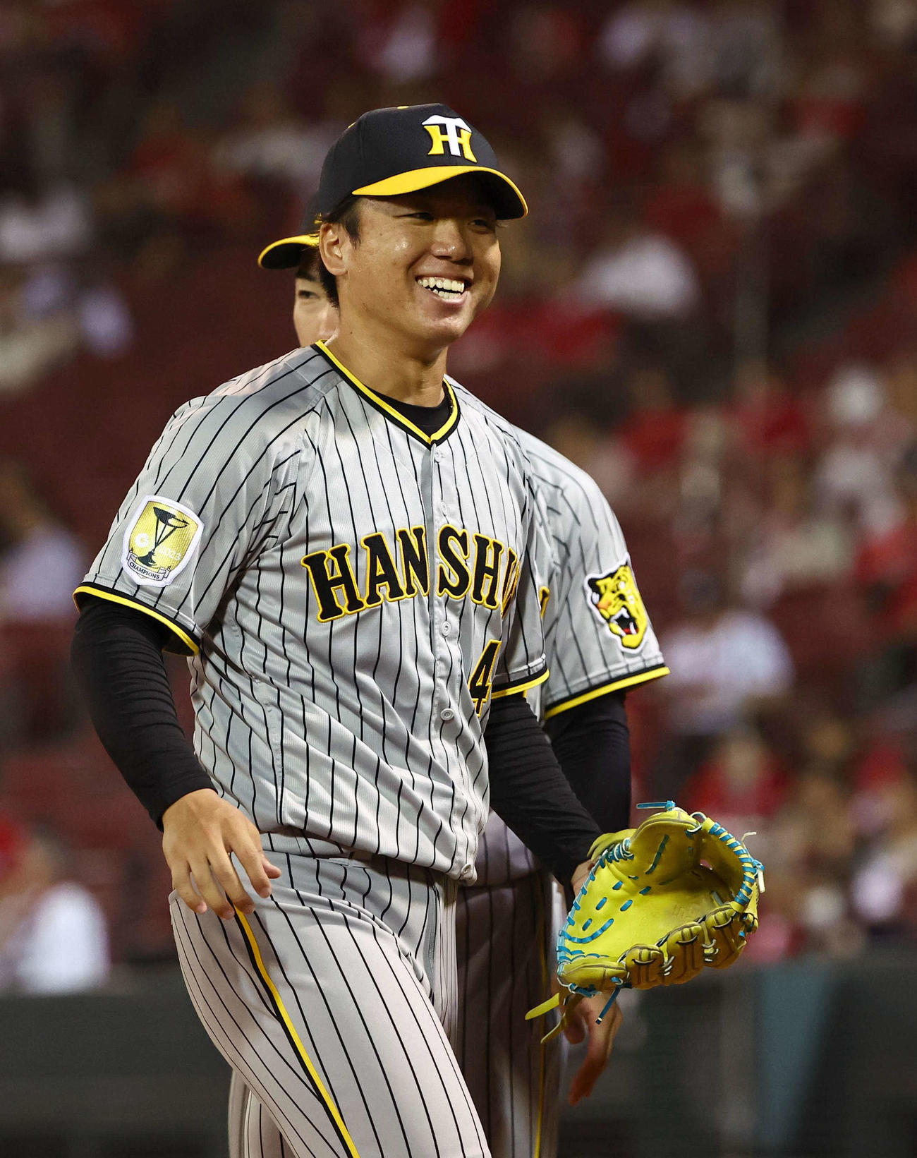 広島対阪神　阪神6番手の村上は11回を無失点に抑え笑顔を見せる（撮影・上田博志）