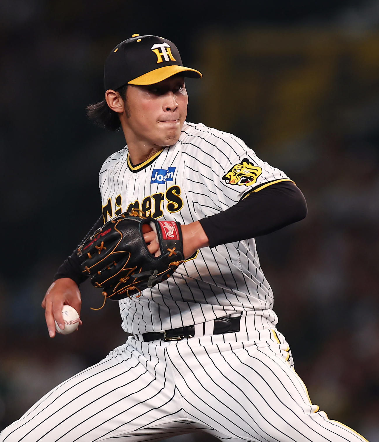 阪神対DeNA 7回表、プロ初登板で力投する阪神3番手の佐藤蓮（撮影・前田充）