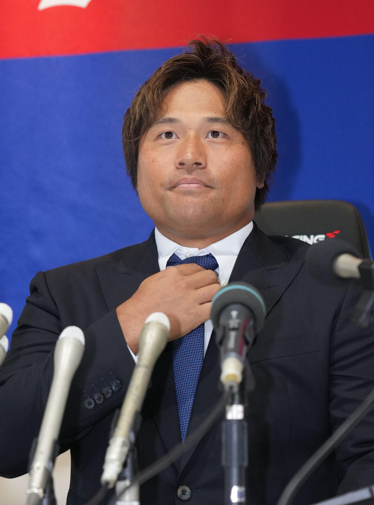 来季の中日外野守備コーチ就任が決まり会見する平田（撮影・森本幸一）
