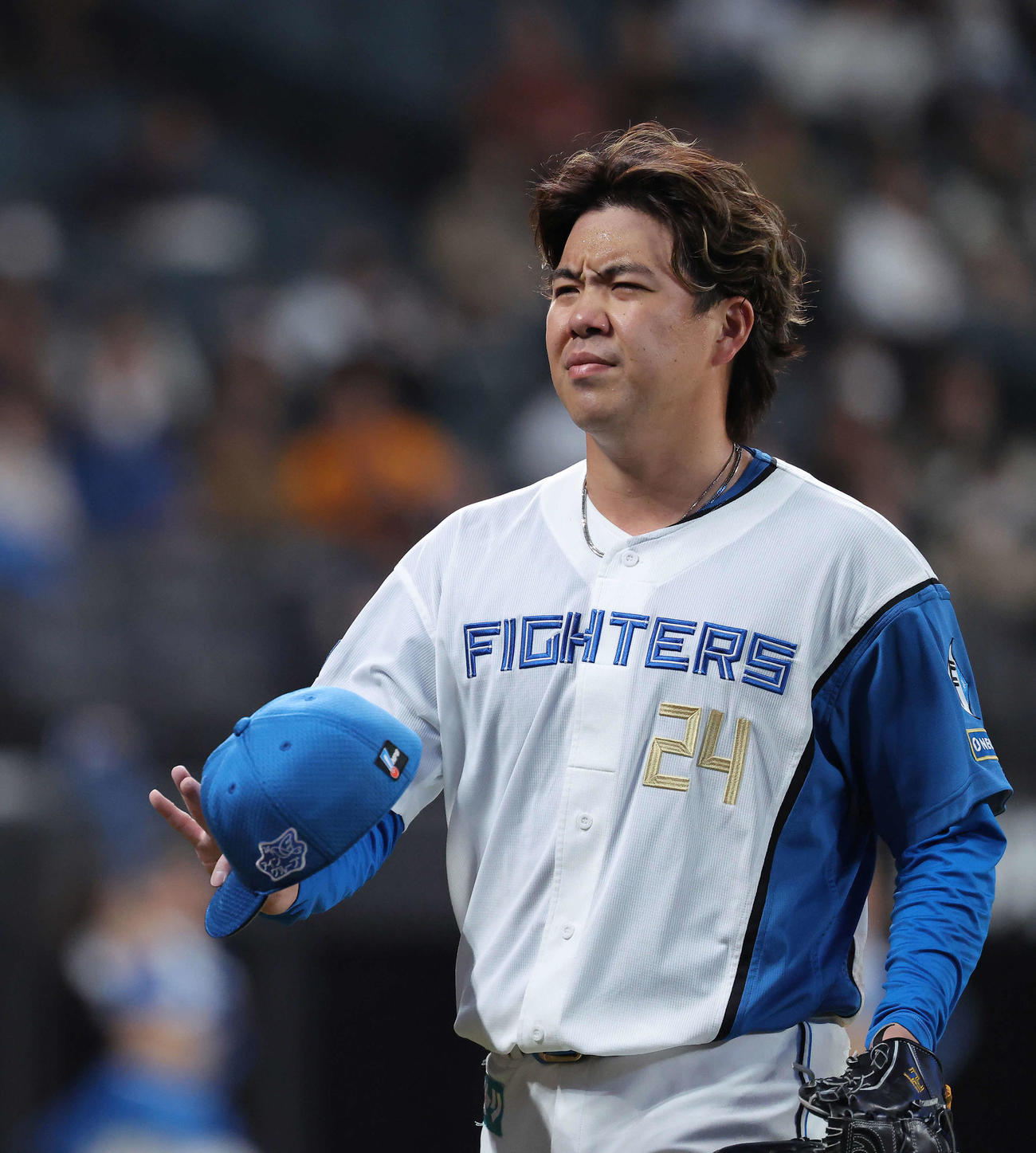 日本ハム対西武　4回表を抑えベンチに戻る金村（撮影・河田真司）