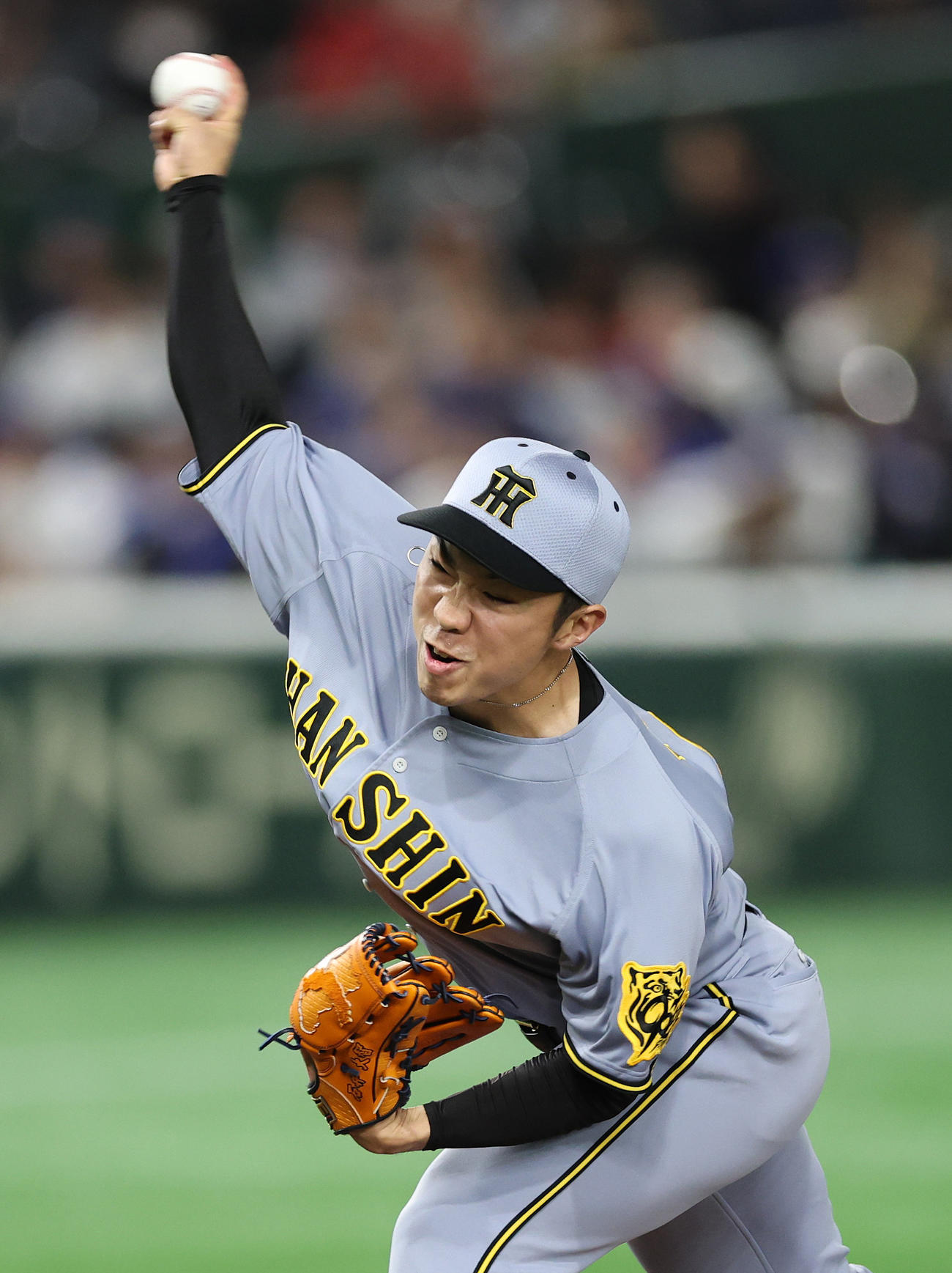 阪神対ドジャース　力投する阪神石井（撮影・野上伸悟）