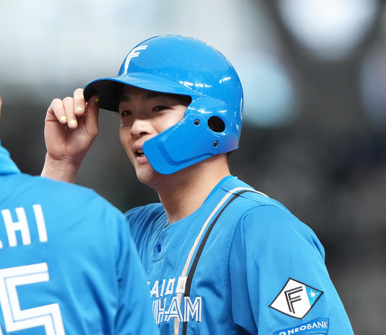 西武対日本ハム　4回表日本ハム1死二、三塁、郡司は左前適時打を放ち笑顔（撮影・足立雅史）