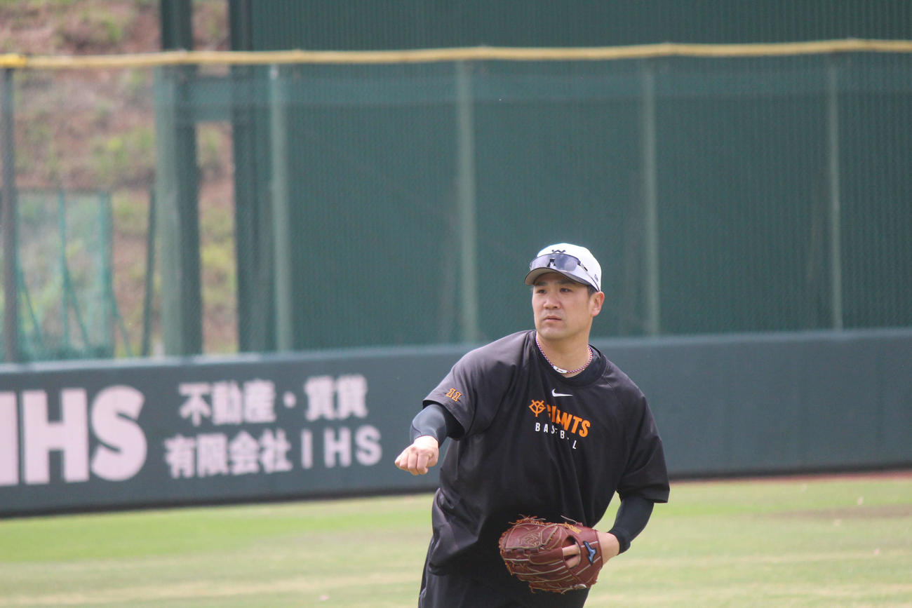 キャッチボールを行う田中