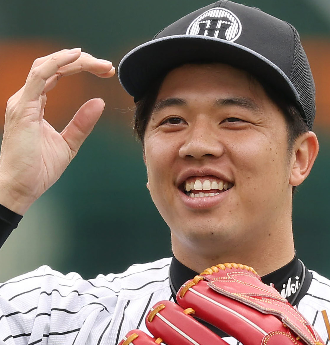 笑顔で練習に臨む阪神才木（撮影・前田充）