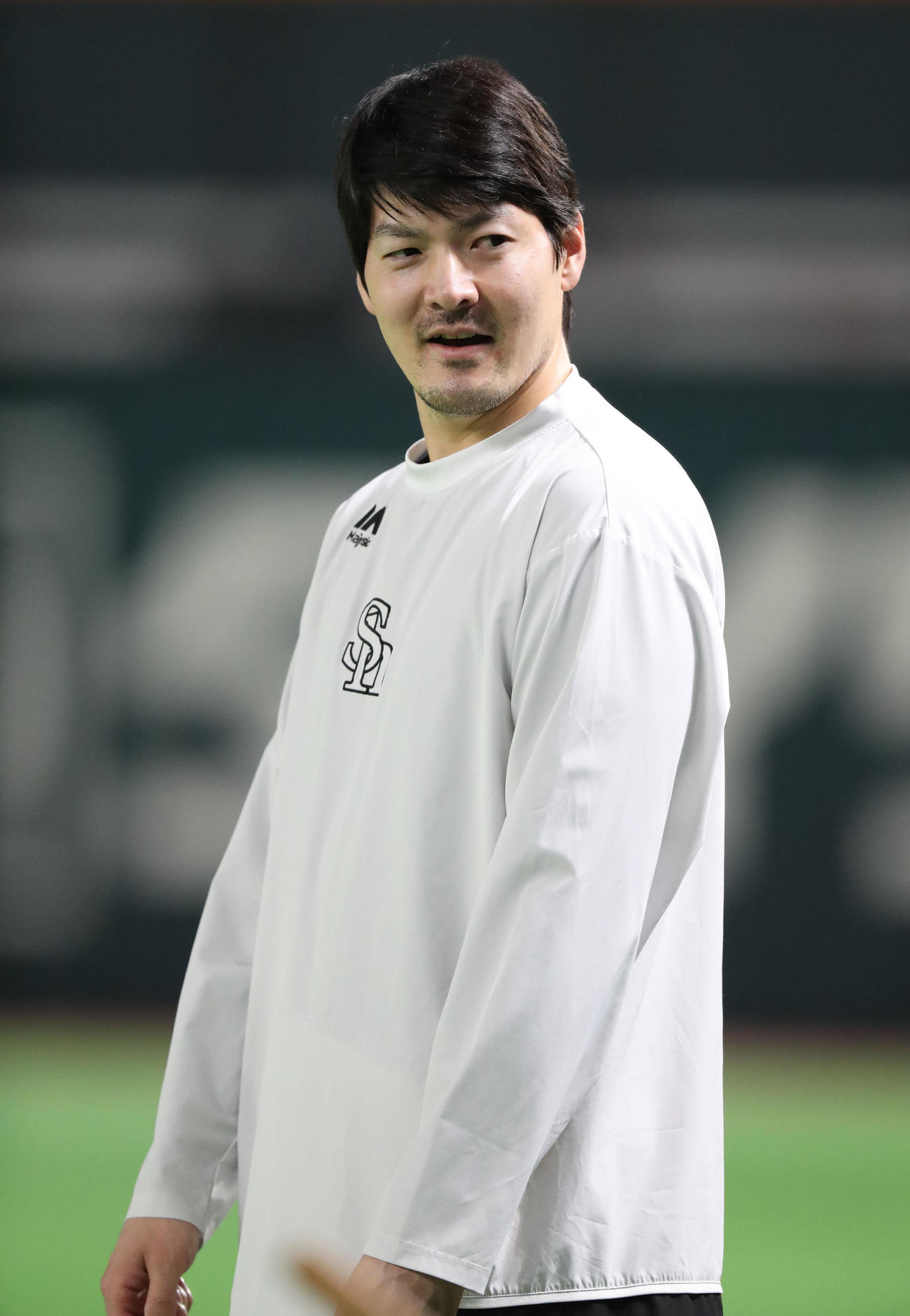 練習前、リラックスした表情を見せる有原（撮影・梅根麻紀）