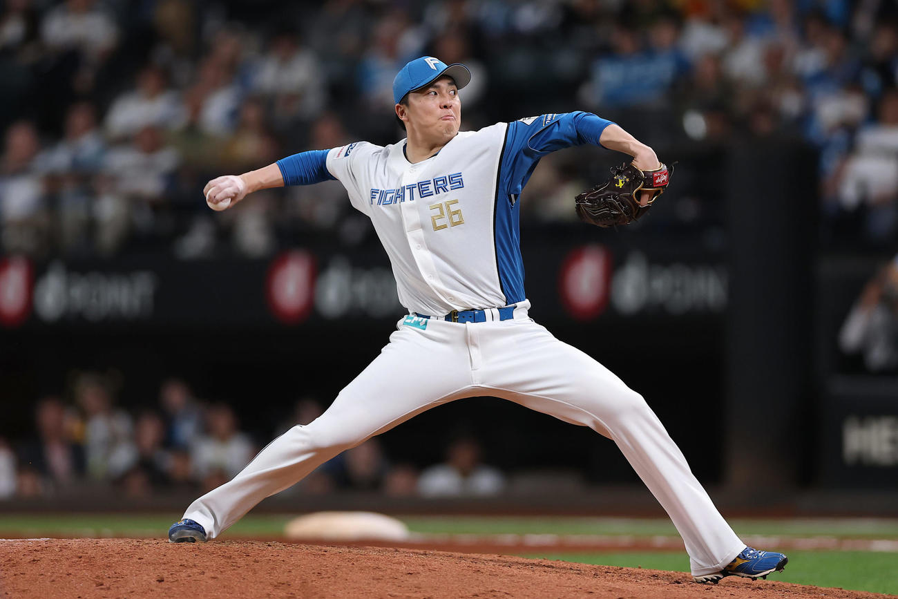 日本ハム対阪神　日本ハム5番手の田中（撮影・前田充）