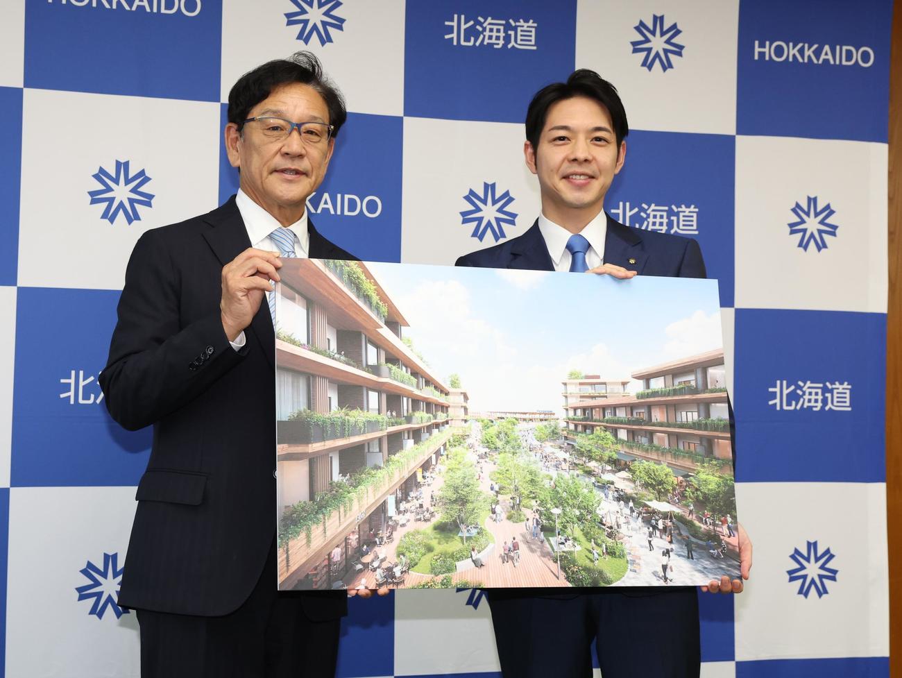 鈴木北海道知事（右）と日本ハム2軍施設イメージ図を持ち笑顔の栗山CBO（撮影・黒川智章）