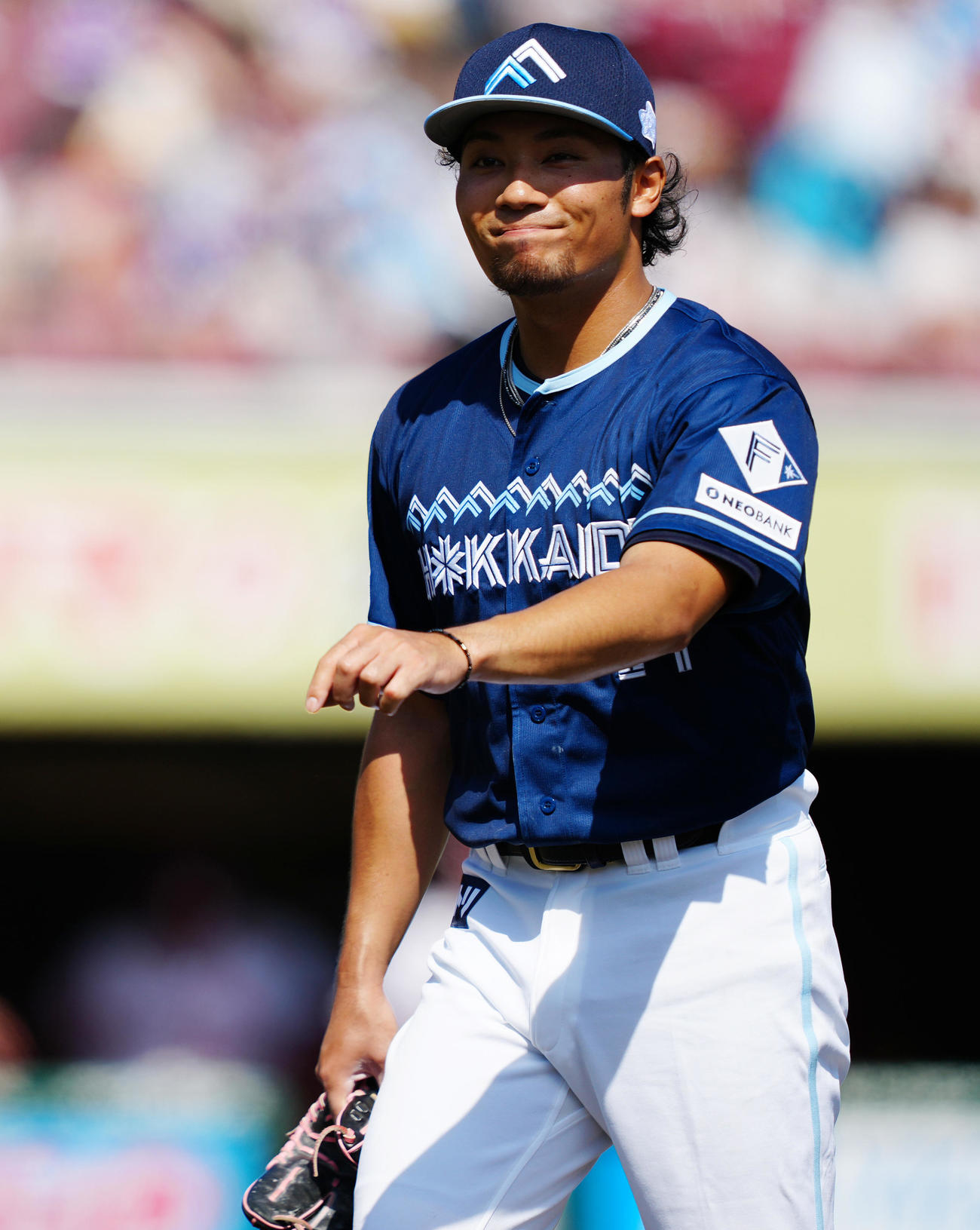 楽天対日本ハム　1回裏を無失点に抑え、笑顔の日本ハム伊藤大（撮影・鈴木みどり）