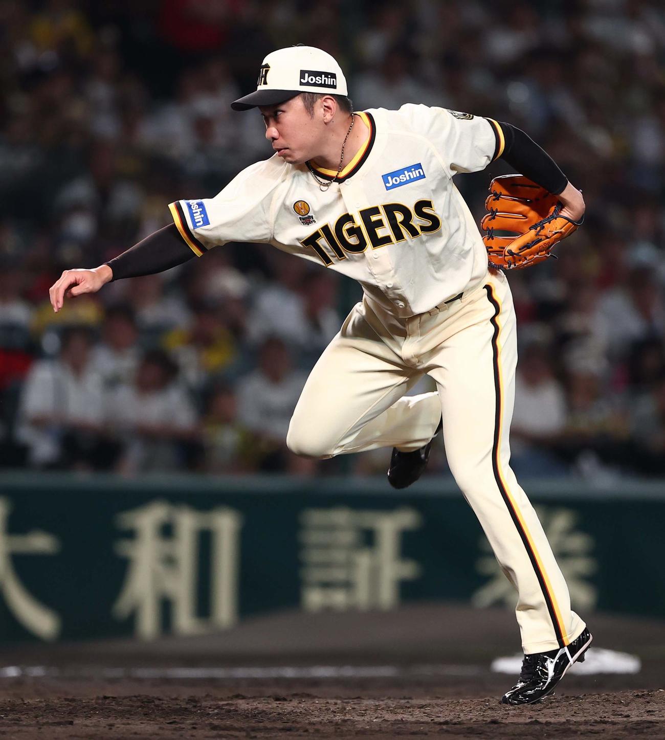 阪神対広島　阪神3番手の石井（撮影・上田博志）