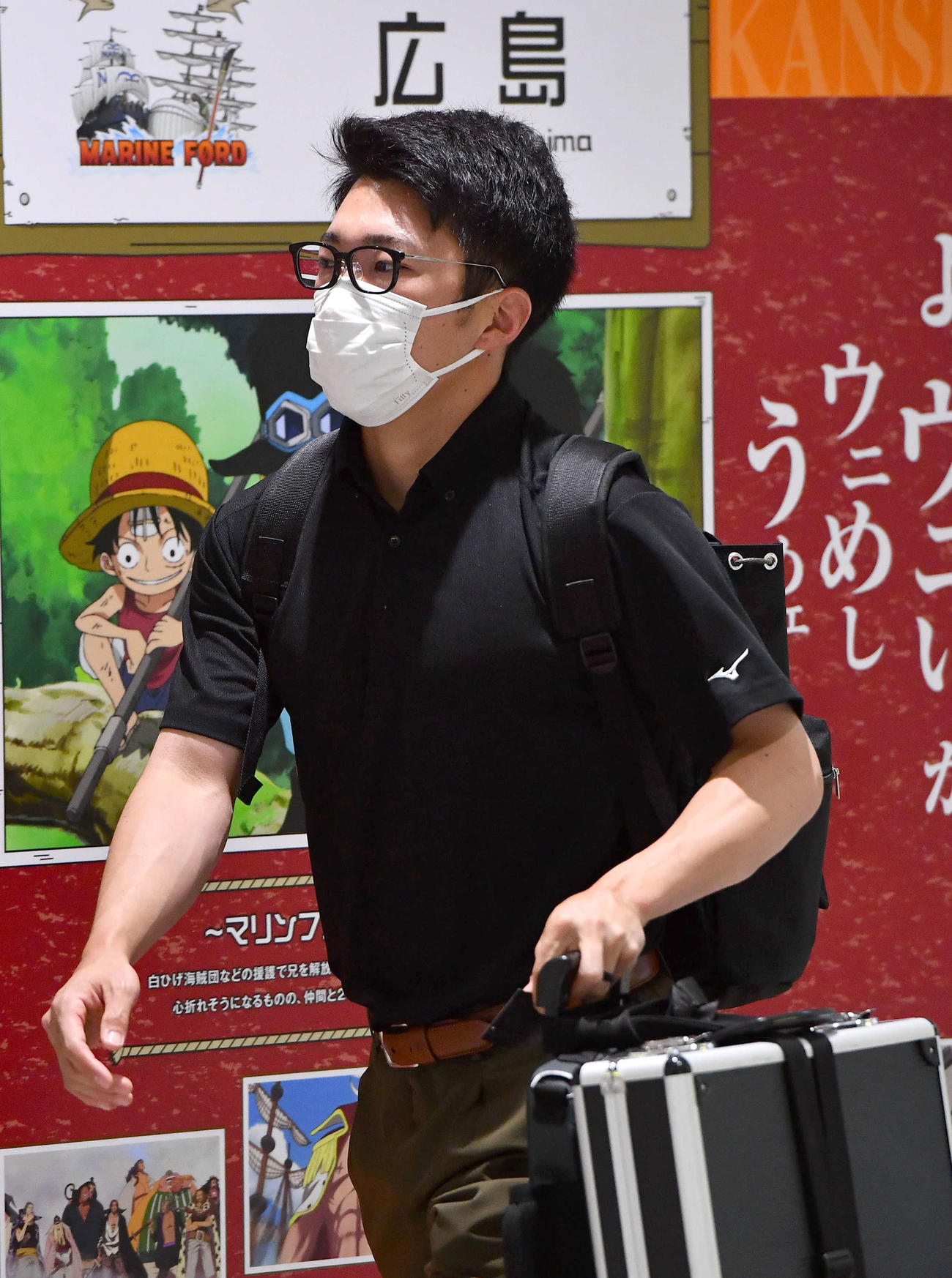 広島から移動する阪神石井（撮影・岩下翔太）