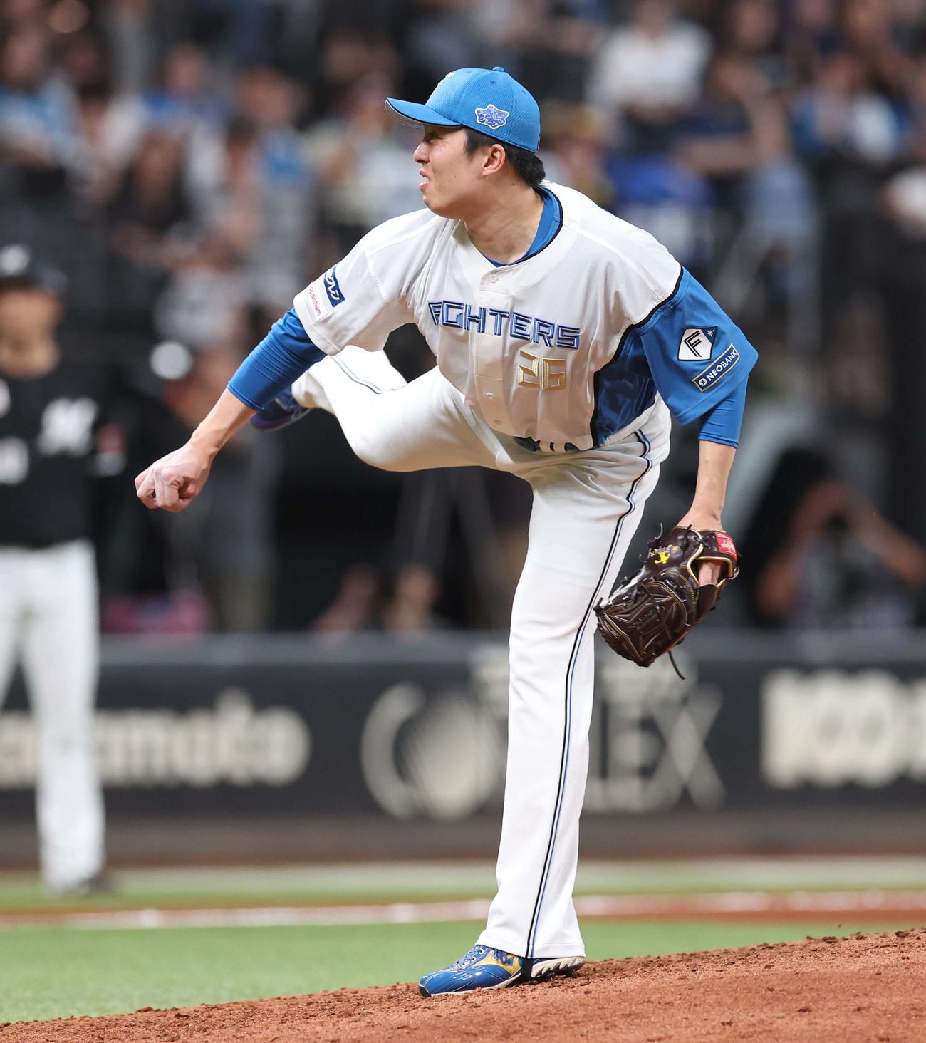 日本ハム対ロッテ　8回に登板の田中（撮影・黒川智章）