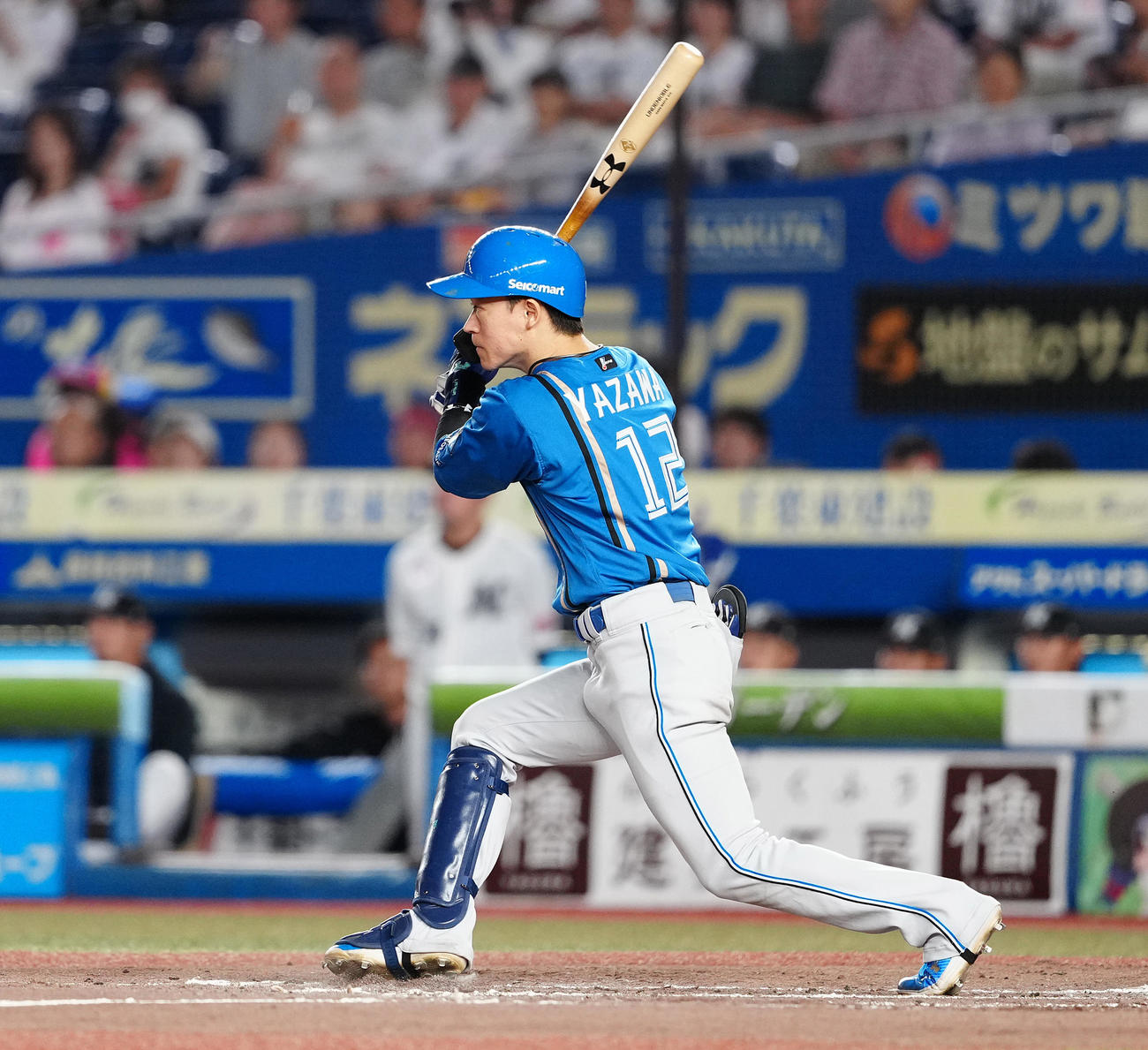 ロッテ対日本ハム　3回表日本ハム無死二、三塁、右前適時打を放つ矢沢（撮影・鈴木みどり）