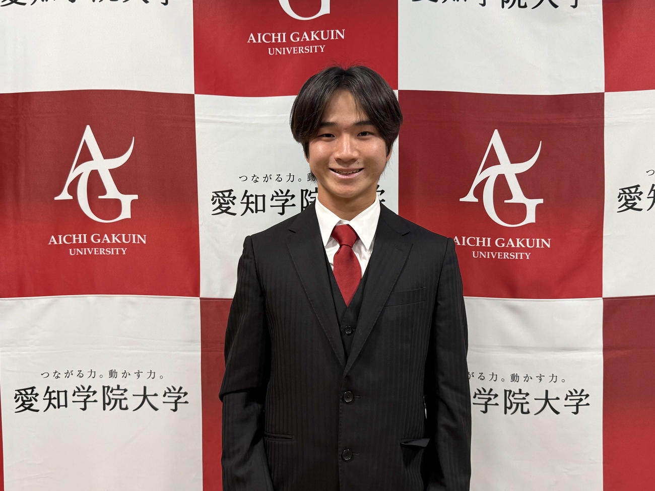 指名あいさつを受けた育成ドラフト3位の愛知学院大・杉山（球団提供）