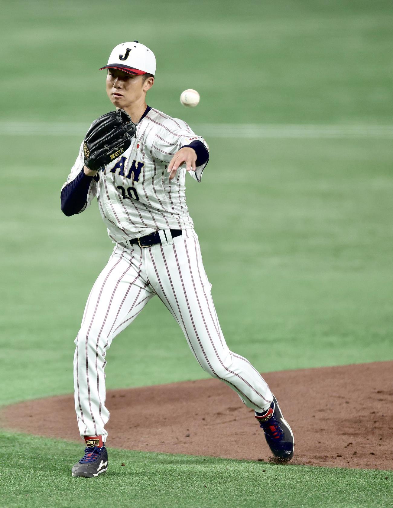 投手練習に臨む曽谷（撮影・河田真司）