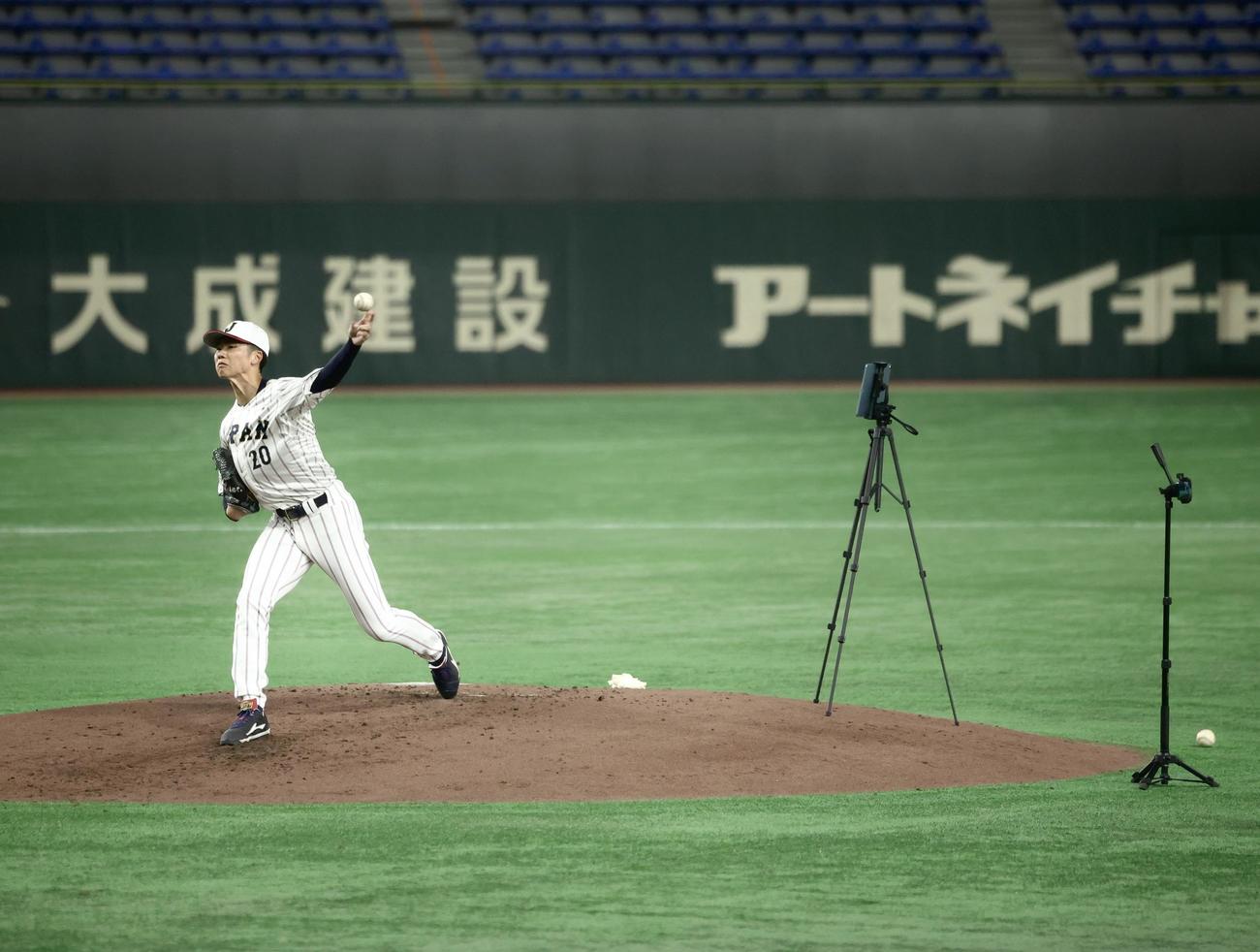 投手練習に臨む曽谷（撮影・河田真司）