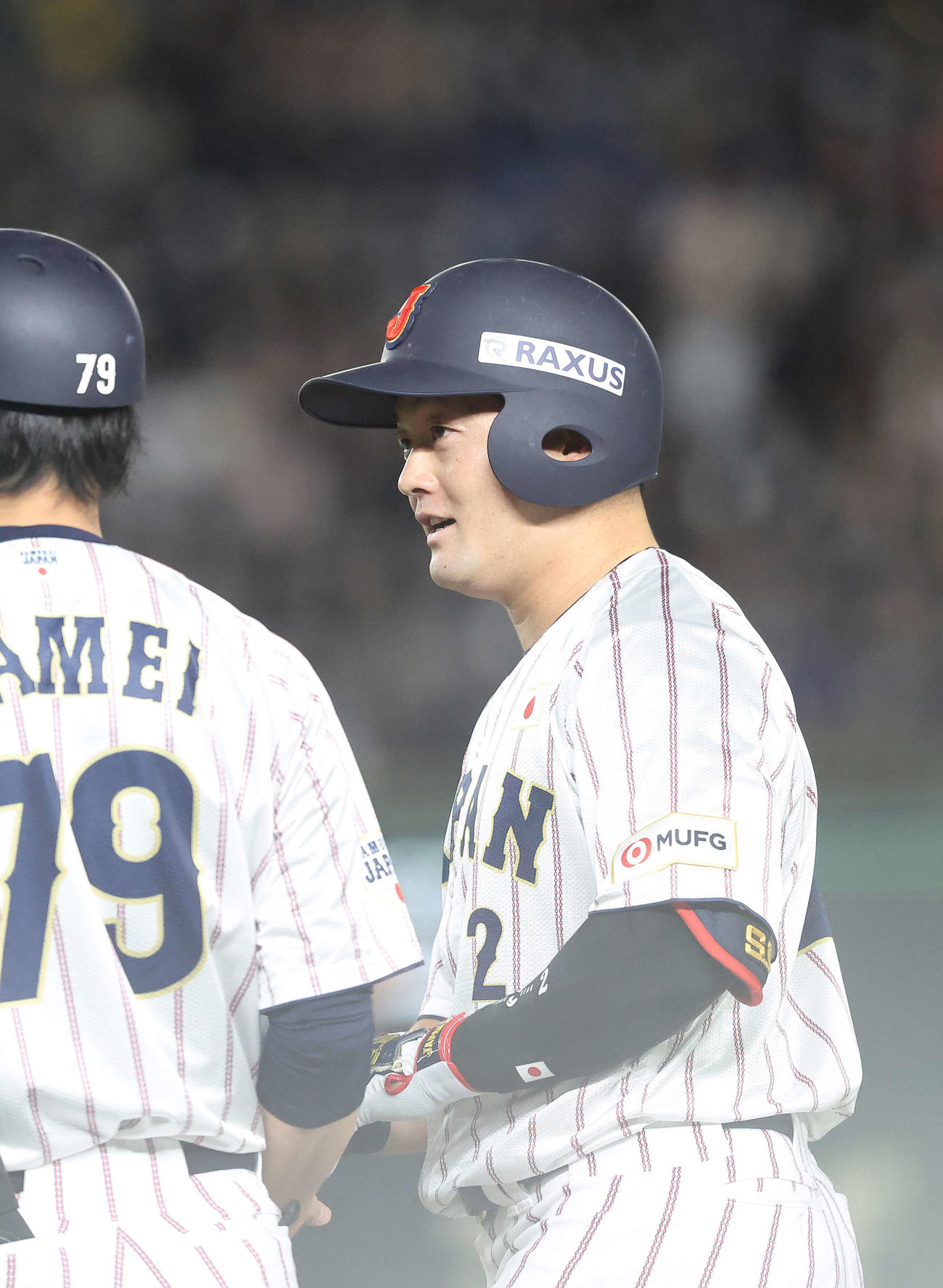 日本対韓国　日本対韓国　4回裏日本1死二、三塁、左前適時打を放ち出塁する牧（撮影・河田真司）