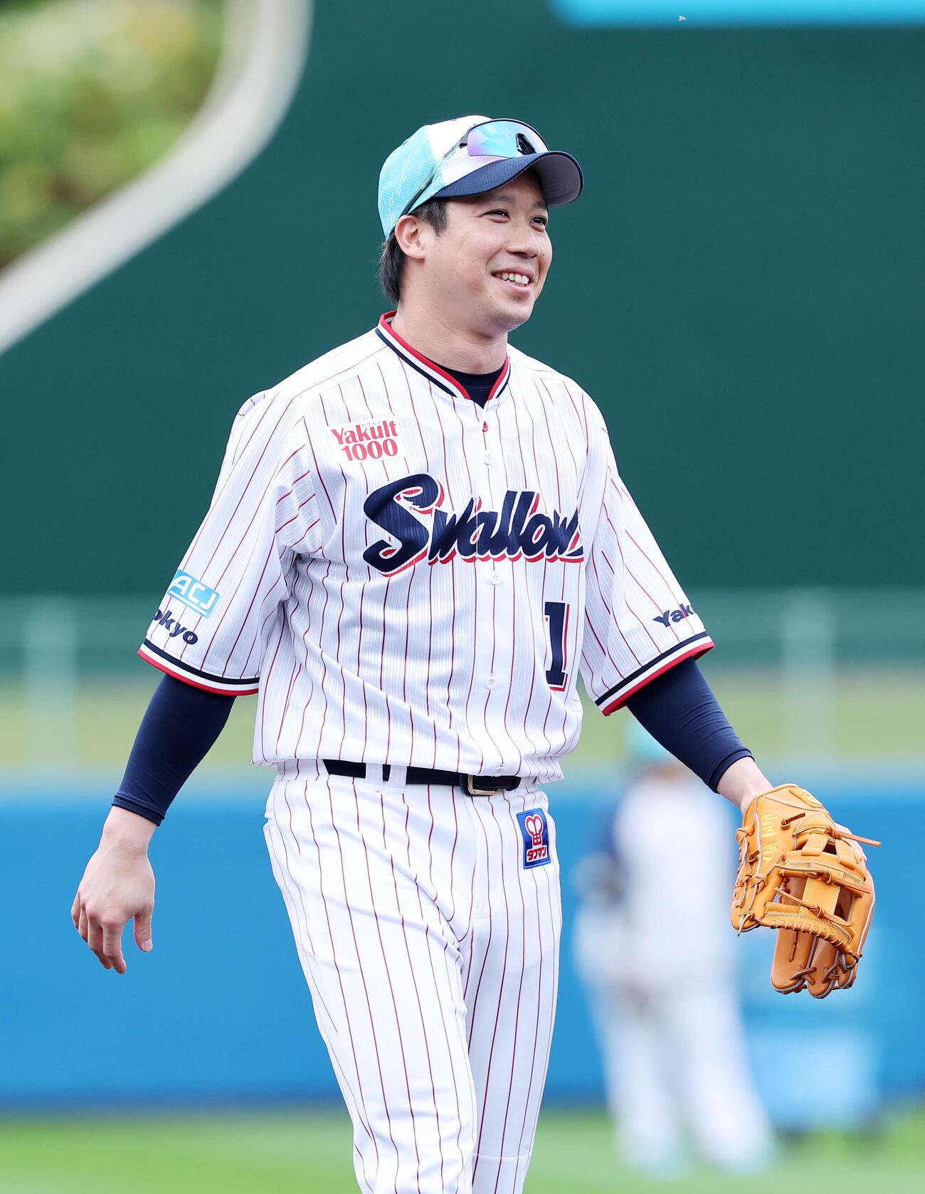 笑顔を見せるヤクルト山田（撮影・鈴木正人）　