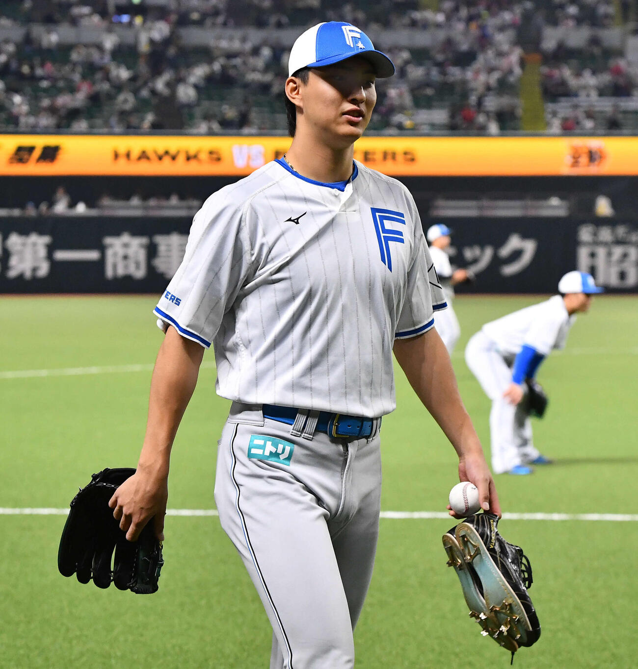 ソフトバンク対日本ハム　試合前、練習を終えて引き揚げる日本ハム達（撮影・岩下翔太）