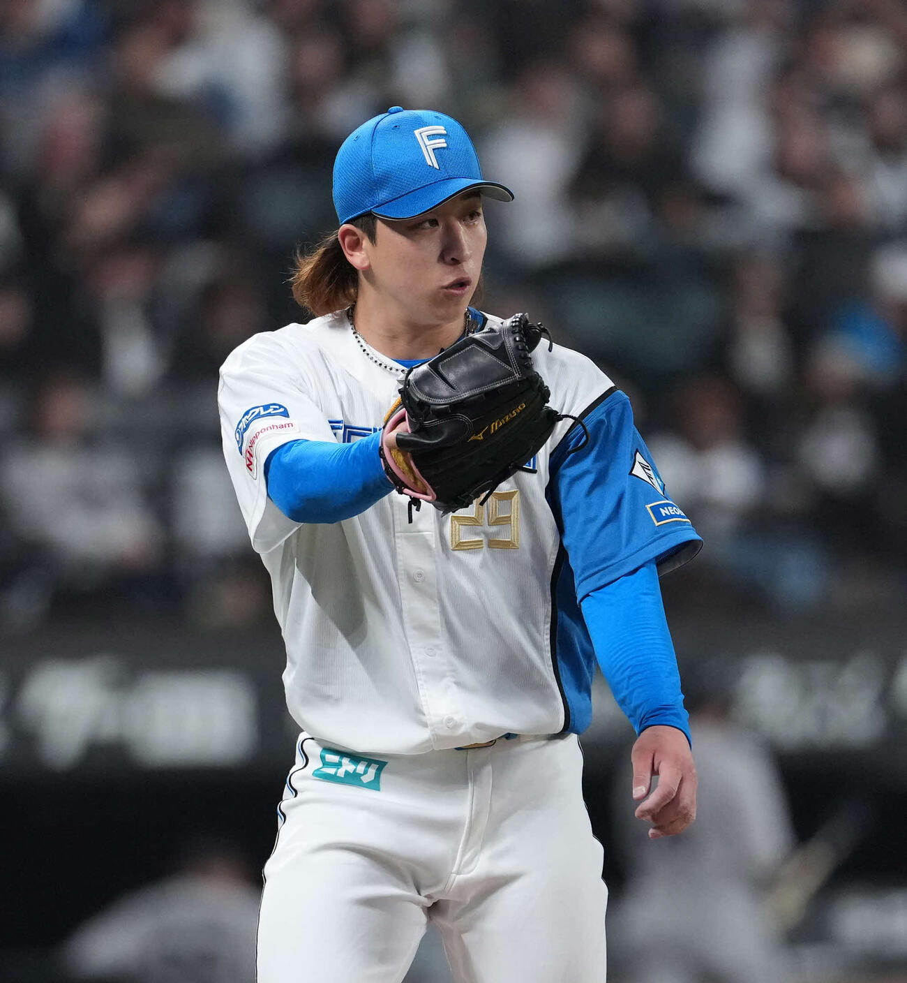日本ハム対ロッテ　7回を終え引き揚げる日本ハム先発の細野（撮影・井上学）