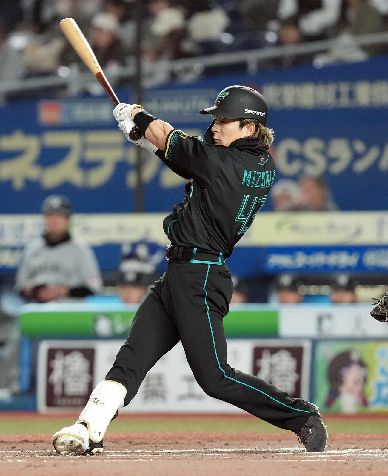 ロッテ対日本ハム　3回表日本ハム無死一、三塁、先制の中犠飛を放つ水野（撮影・たえ見朱実）