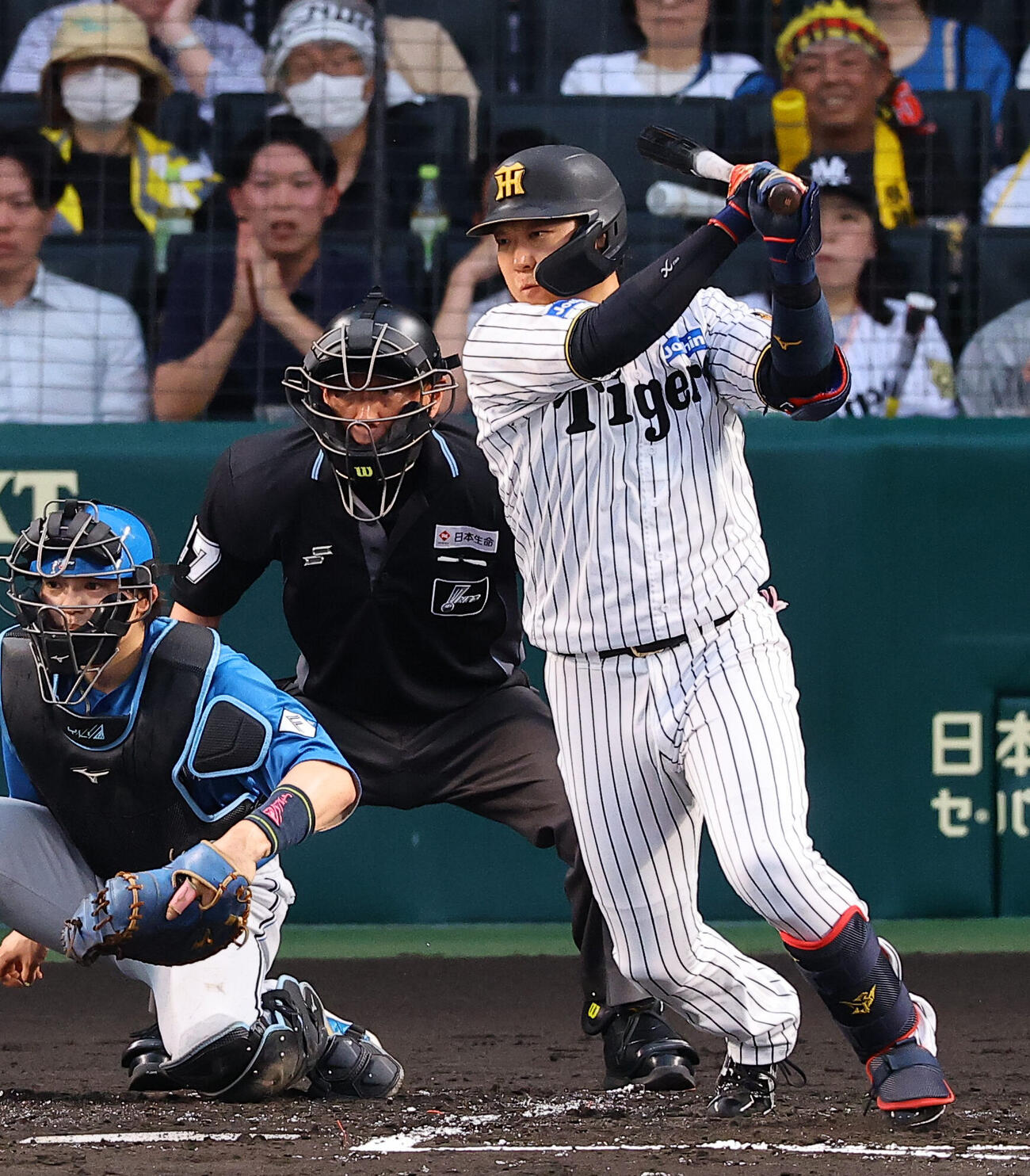 阪神対日本ハム　1回裏阪神2死一、二塁、大山悠輔は先制適時打を放つ（撮影・上田博志）