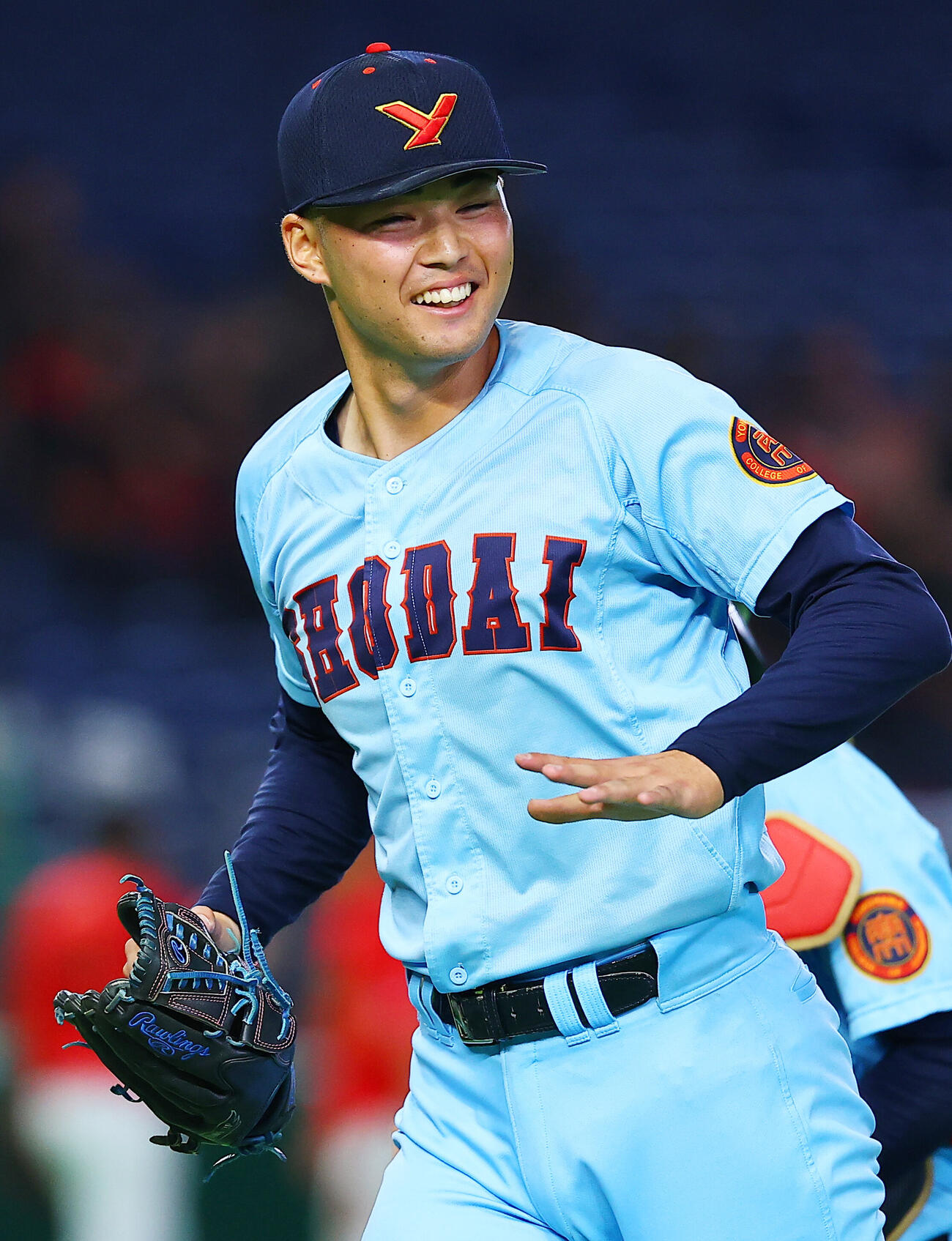 全日本大学野球選手権　日本文理大対横浜商大　3回表を終え笑顔でベンチに戻る横浜商大先発の佐藤諒音（撮影・野上伸悟）
