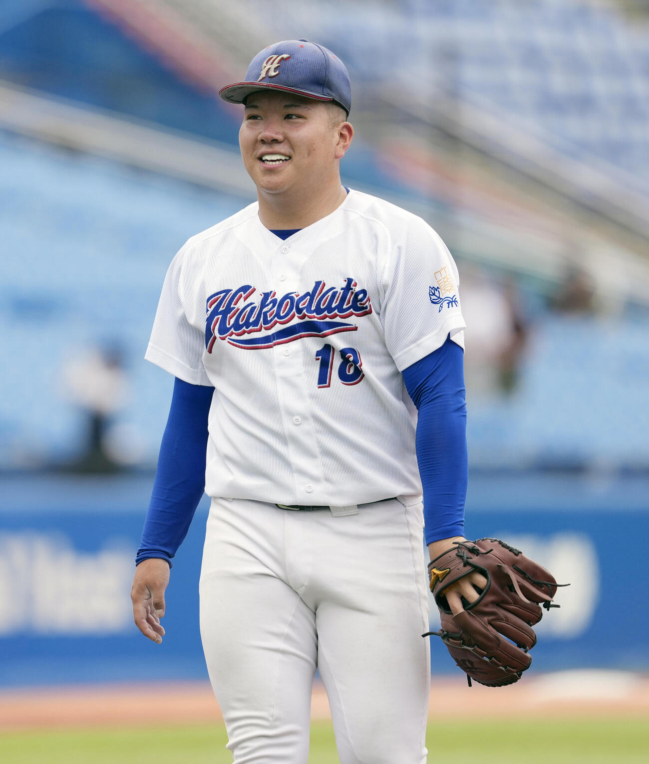 全日本大学野球選手権大会　函館大対上武大　4回裏上武大2死、磯野真夢を右飛に仕留め笑顔を見せる石岡流音（撮影・小島史椰）＝2026年6月9日
