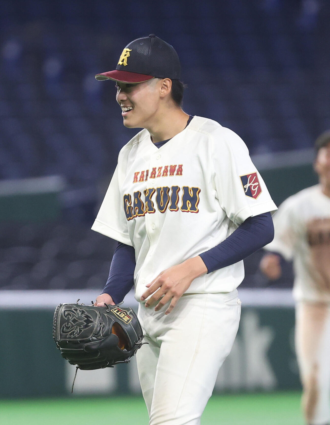 金沢学院大対天理大　6回途中から登板した金沢学院大・糸井琉翔は勝利し笑顔を見せる　（撮影・柴田隆二）（＝2026年6月9日）　