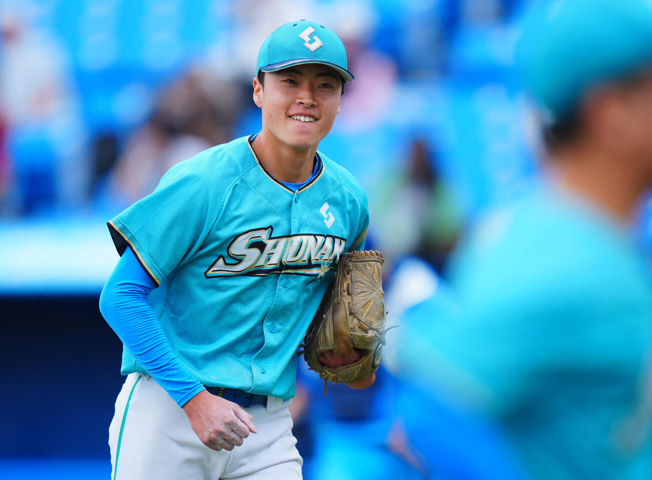 全日本大学野球選手権　2回戦　日体大対周南公立大　1回表日体大の攻撃を無失点で抑え笑顔を見せる周南公立大先発井上心人（撮影・垰建太）