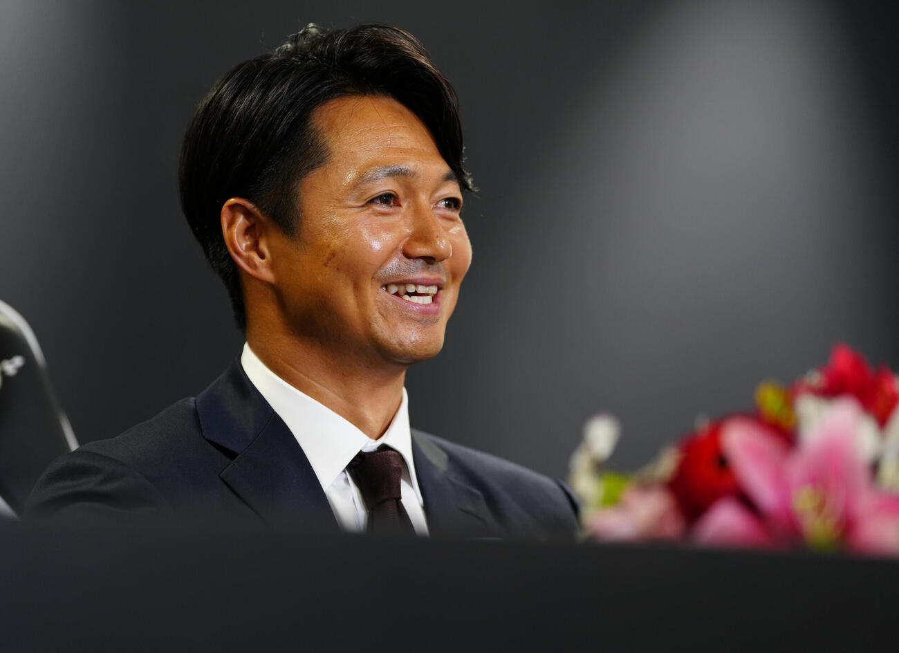 引退会見で笑顔のロッテ唐川侑己（撮影・鈴木みどり）