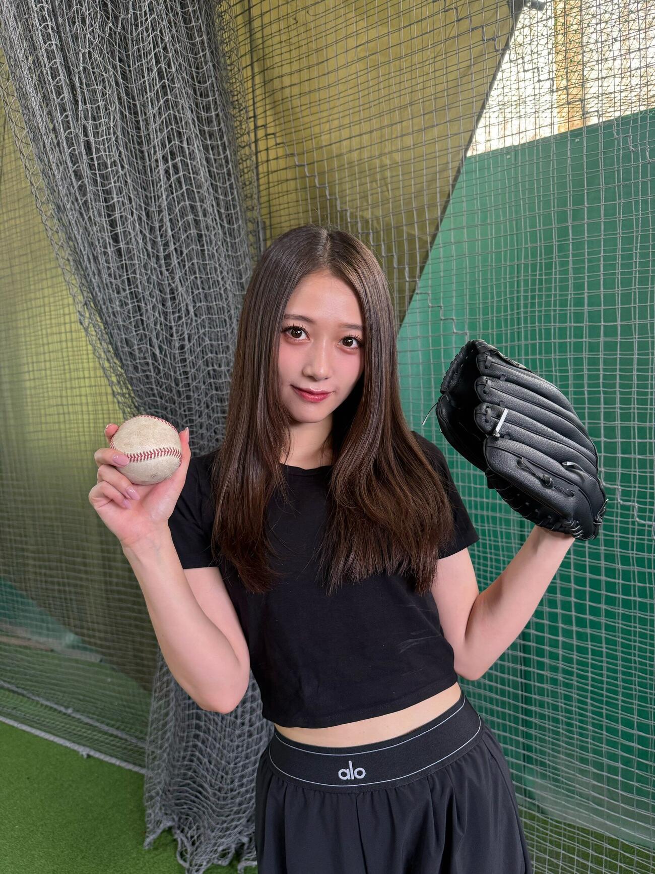 ファーストピッチに向けて練習する谷本安美