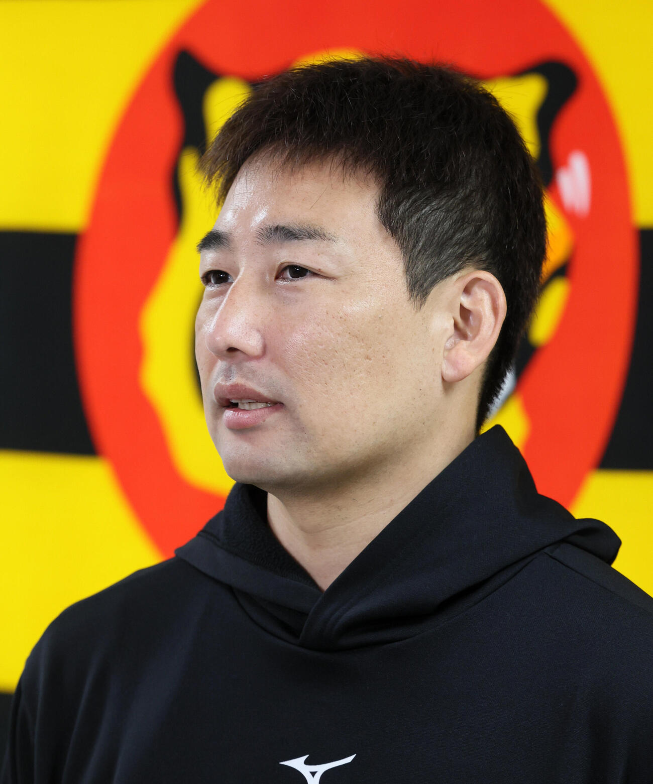 会見を行った阪神岩崎優は海外FA権を行使せず残留すると発表した（撮影・加藤哉）