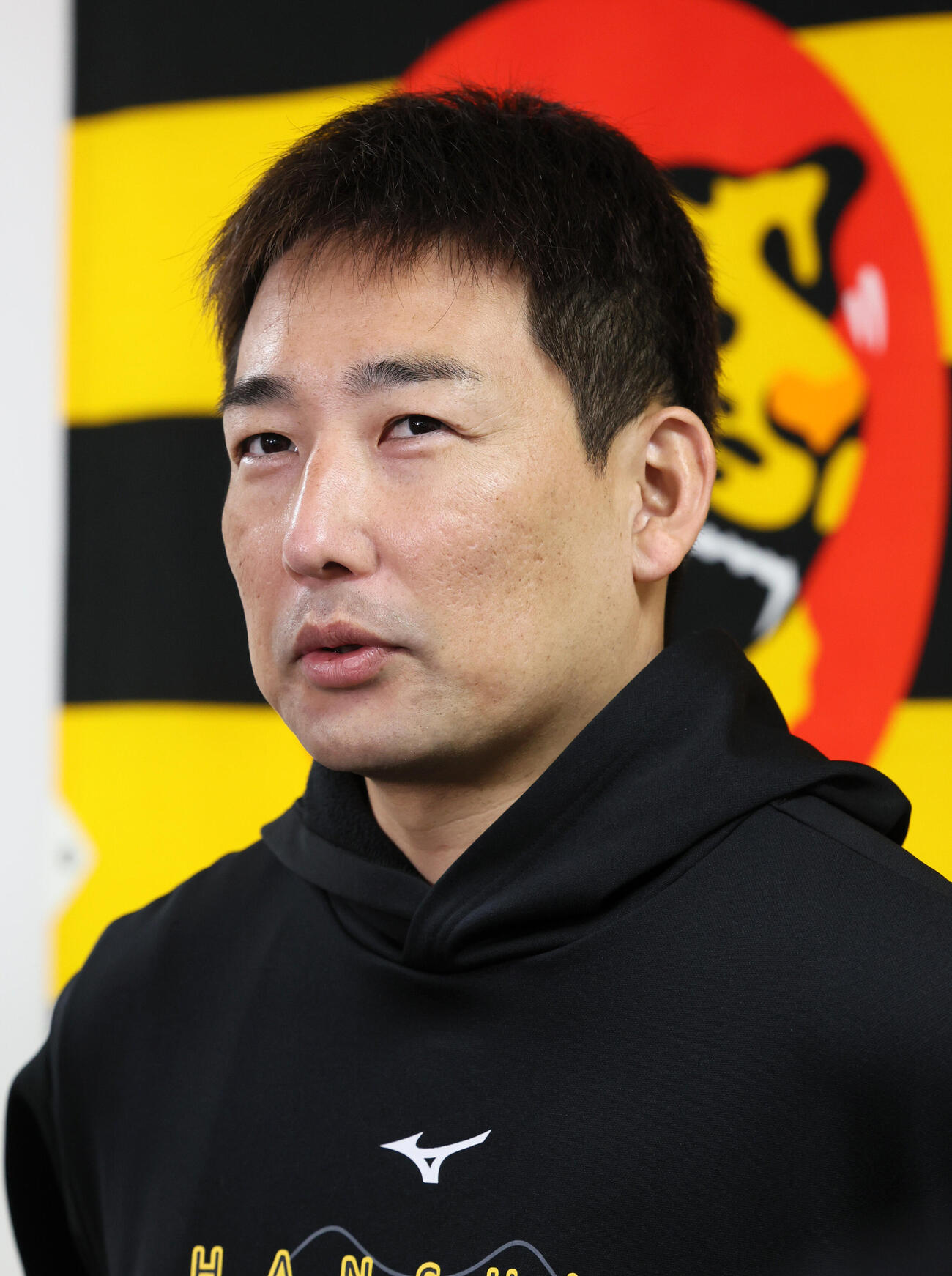 会見を行った阪神岩崎優は海外FA権を行使せず残留すると発表した（撮影・加藤哉）