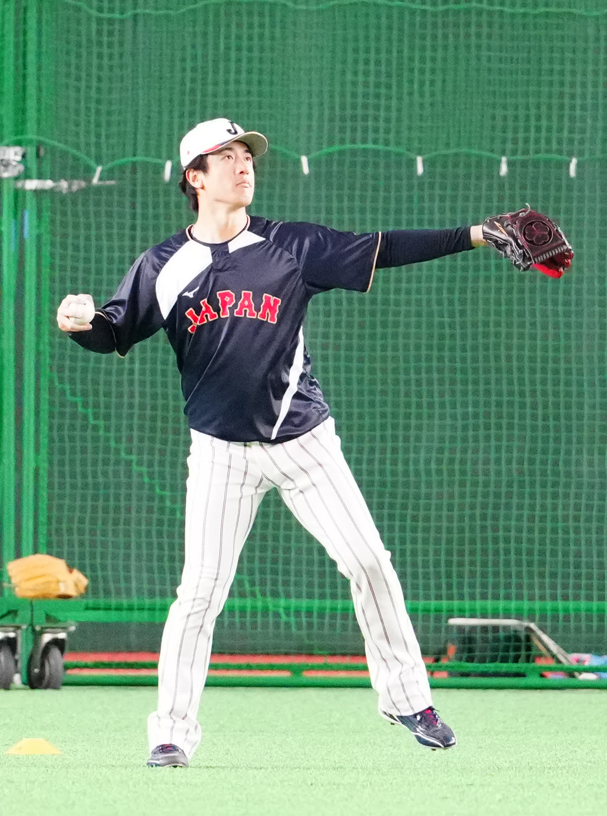 WBC公式練習で投球する北山（撮影・江口和貴）