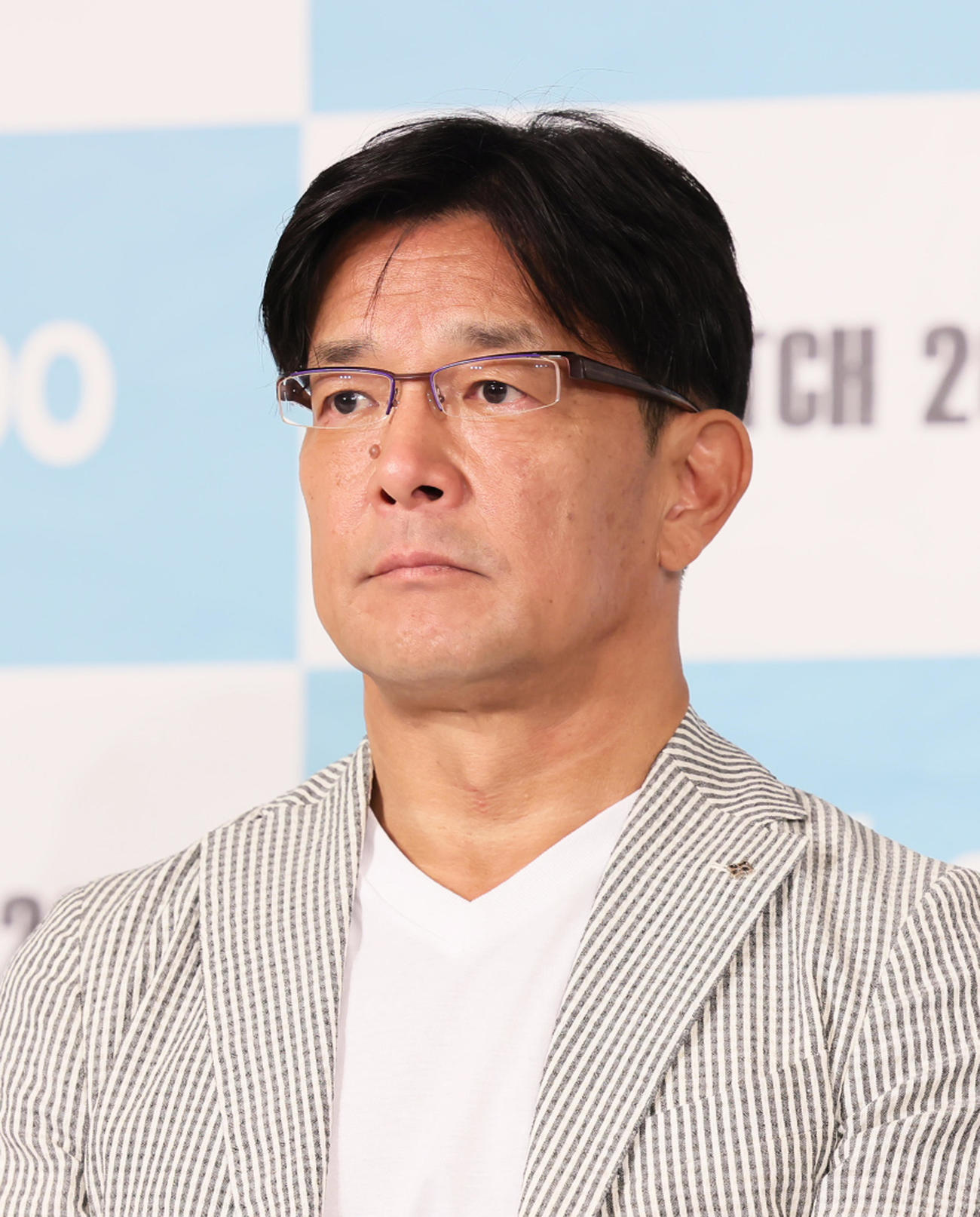 一夜明け会見に臨む大会実行委員の榊原氏（撮影・足立雅史）